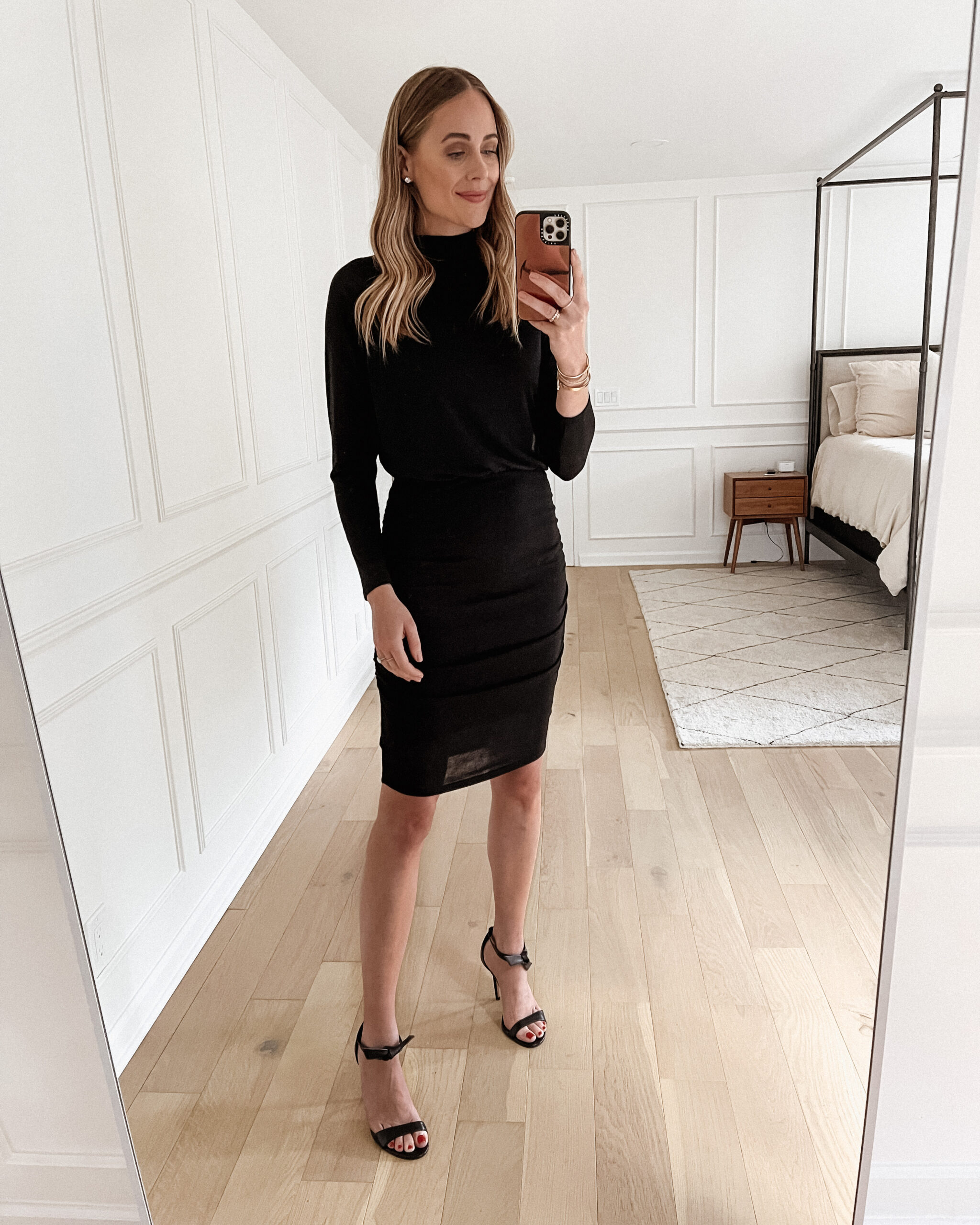 Fashion Jackson Wearing Express Black Long Sleeve Ruched Dress Black Heeled Sandals womens workwear outfit ideas