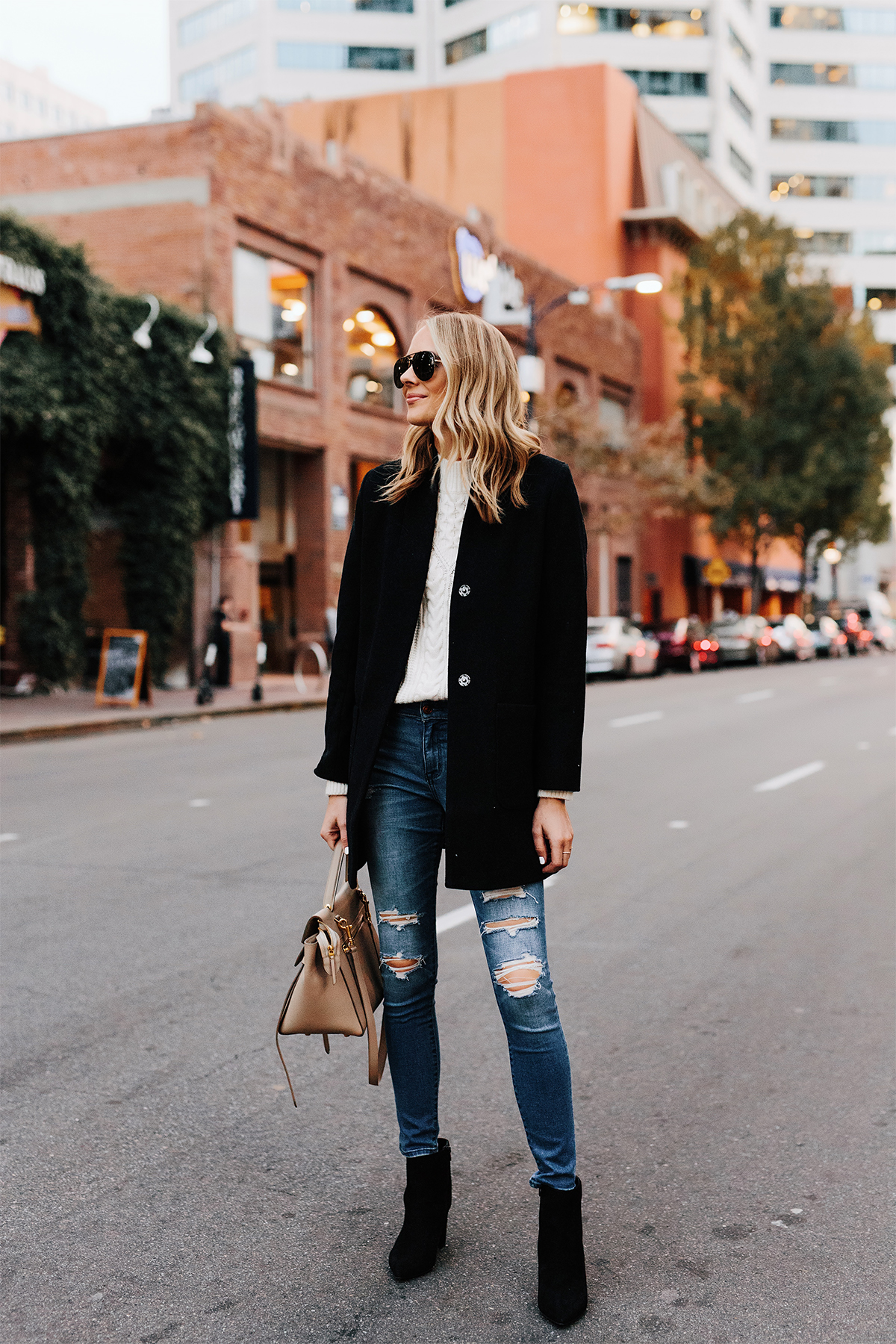 Blonde Woman Wearing Abercrombie Black Wool Coat Cable Knit White Sweater Denim Ripped Skinny Jeans Black Booties Outfit Fashion Jackson San Diego Fashion Blogger Street Style
