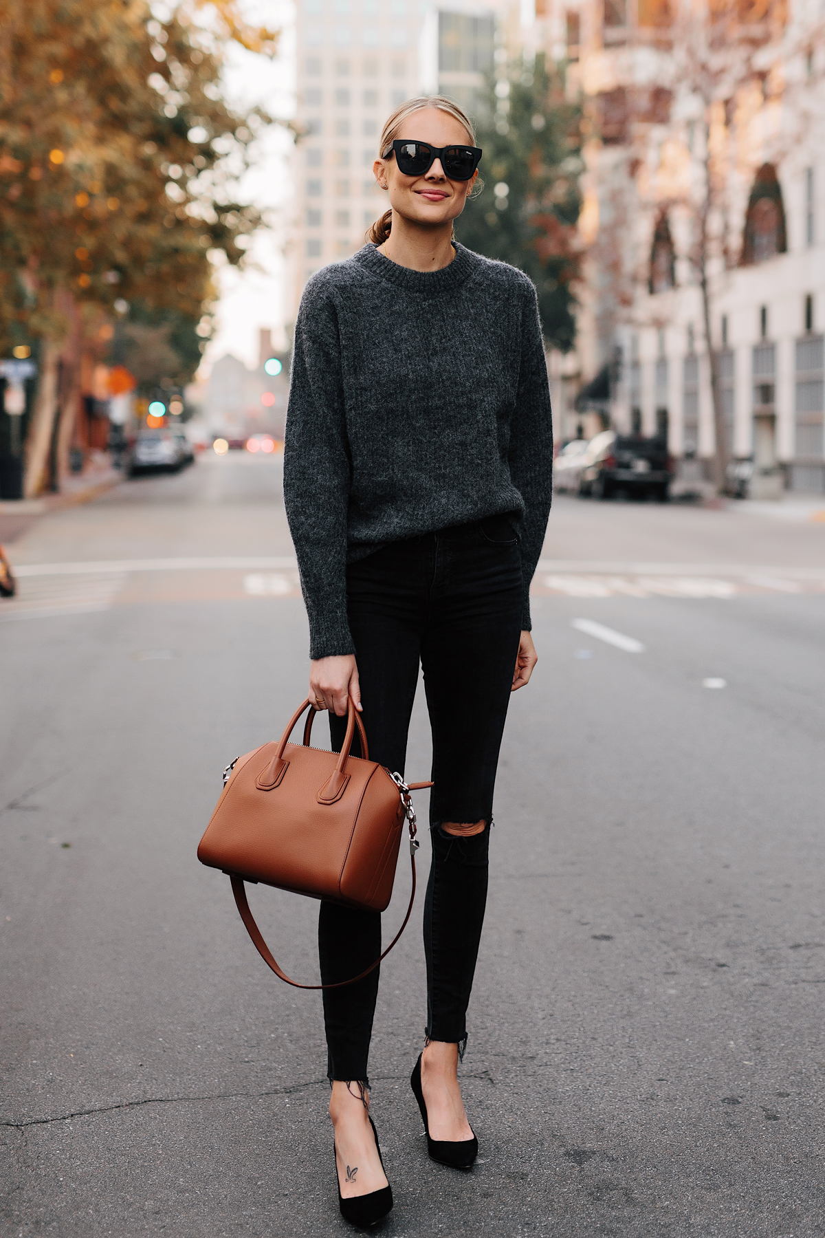 Blonde Woman Wearing Everlane Alpaca Dark Grey Sweater Black Ripped Skinny Jeans Black Heels Tan Satchel Handbag Fashion Jackson San Diego Fashion Blogger Street Style