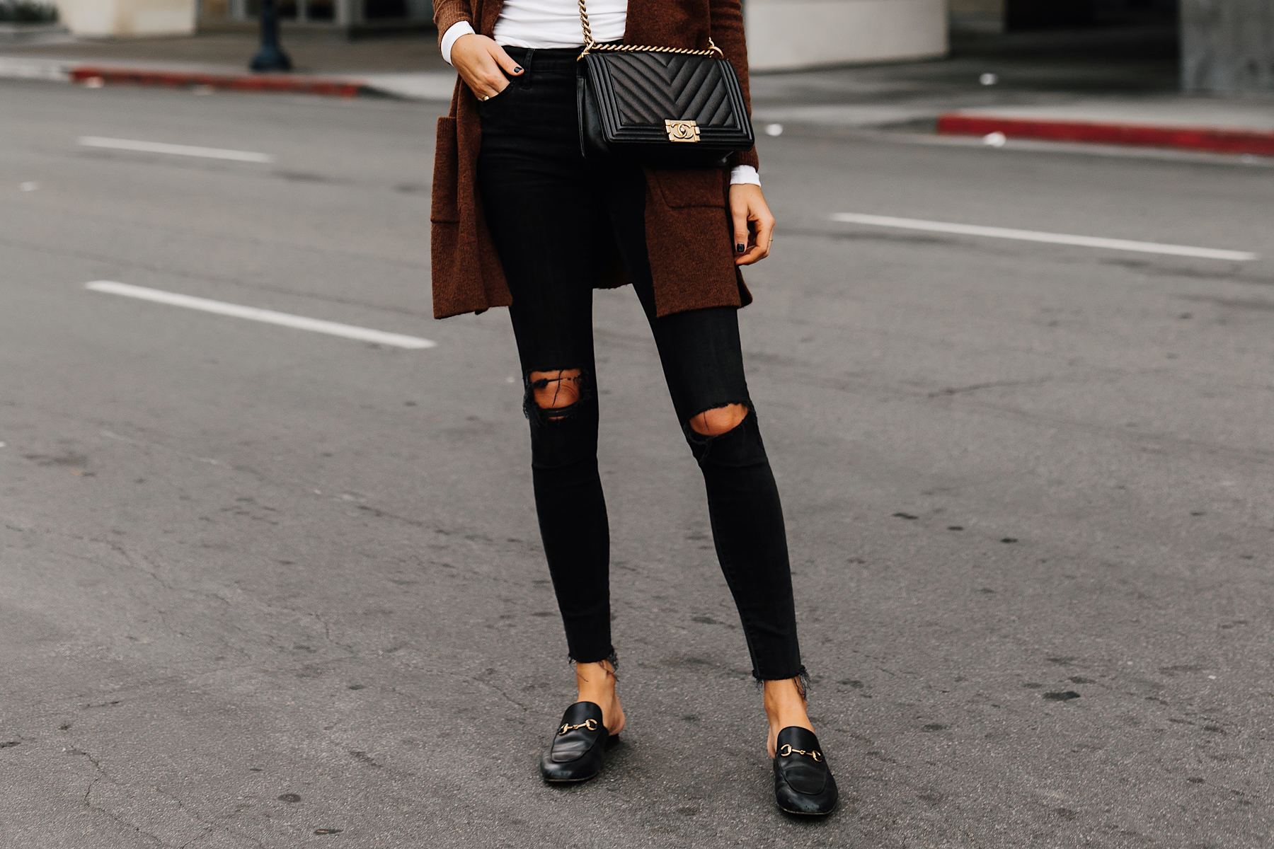 Woman Wearing Madewell Black Ripped Skinny Jeans Gucci Princetown Black Loafer Mules Chanel Black Boy Bag Fashion Jackson San Diego Fashion Blogger Street Style