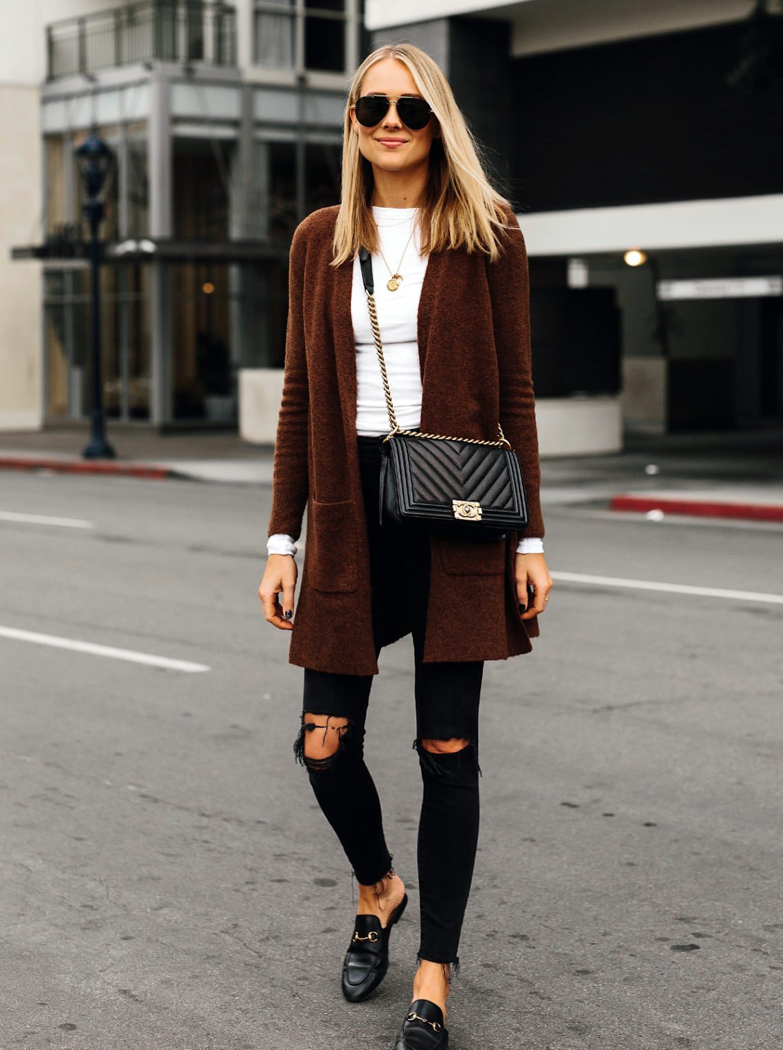 Blonde Woman Wearing Madewell Brown Long Cardigan White Top Madewell Black Ripped Skinny Jeans Gucci Black Princetown Loafer Mules Chanel Black Boy Bag Fashion Jackson San Diego Fashion Blogger Street Style