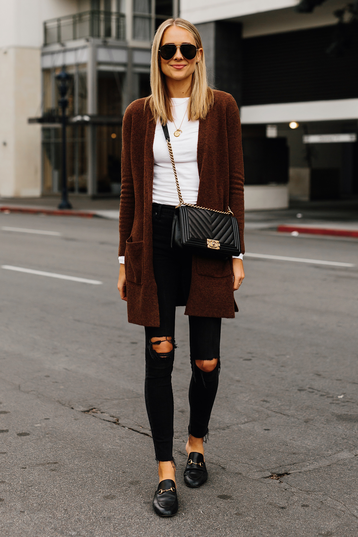 Blonde Woman Wearing Madewell Brown Long Cardigan White Top Madewell Black Ripped Skinny Jeans Gucci Black Princetown Loafer Mules Chanel Black Boy Bag Aviatro Sunglasses Fashion Jackson San Diego Fashion Blogger Street Style