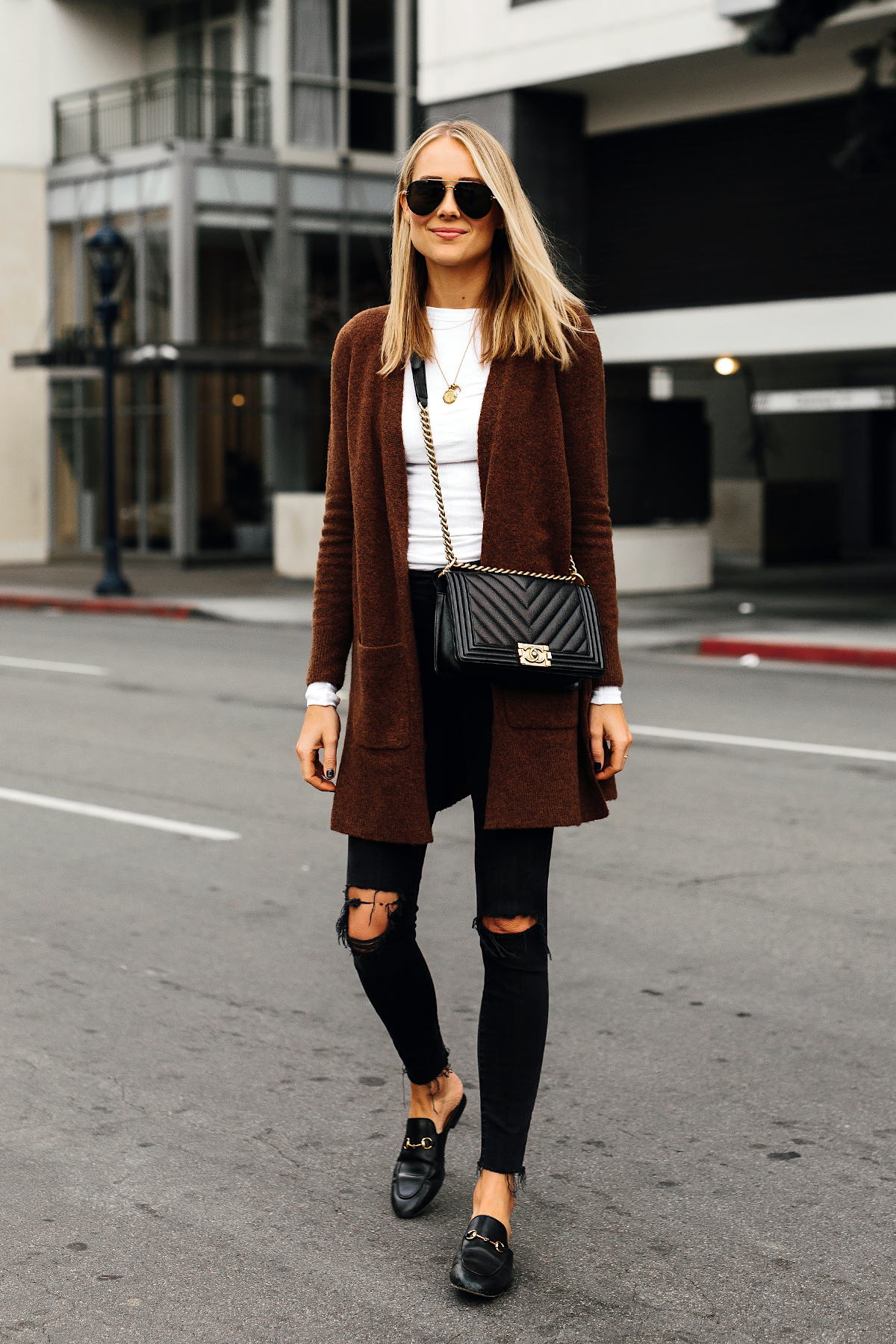 Blonde Woman Wearing Madewell Brown Long Cardigan White Top Madewell Black Ripped Skinny Jeans Gucci Black Princetown Loafer Mules Chanel Black Boy Bag Fashion Jackson San Diego Fashion Blogger Street Style