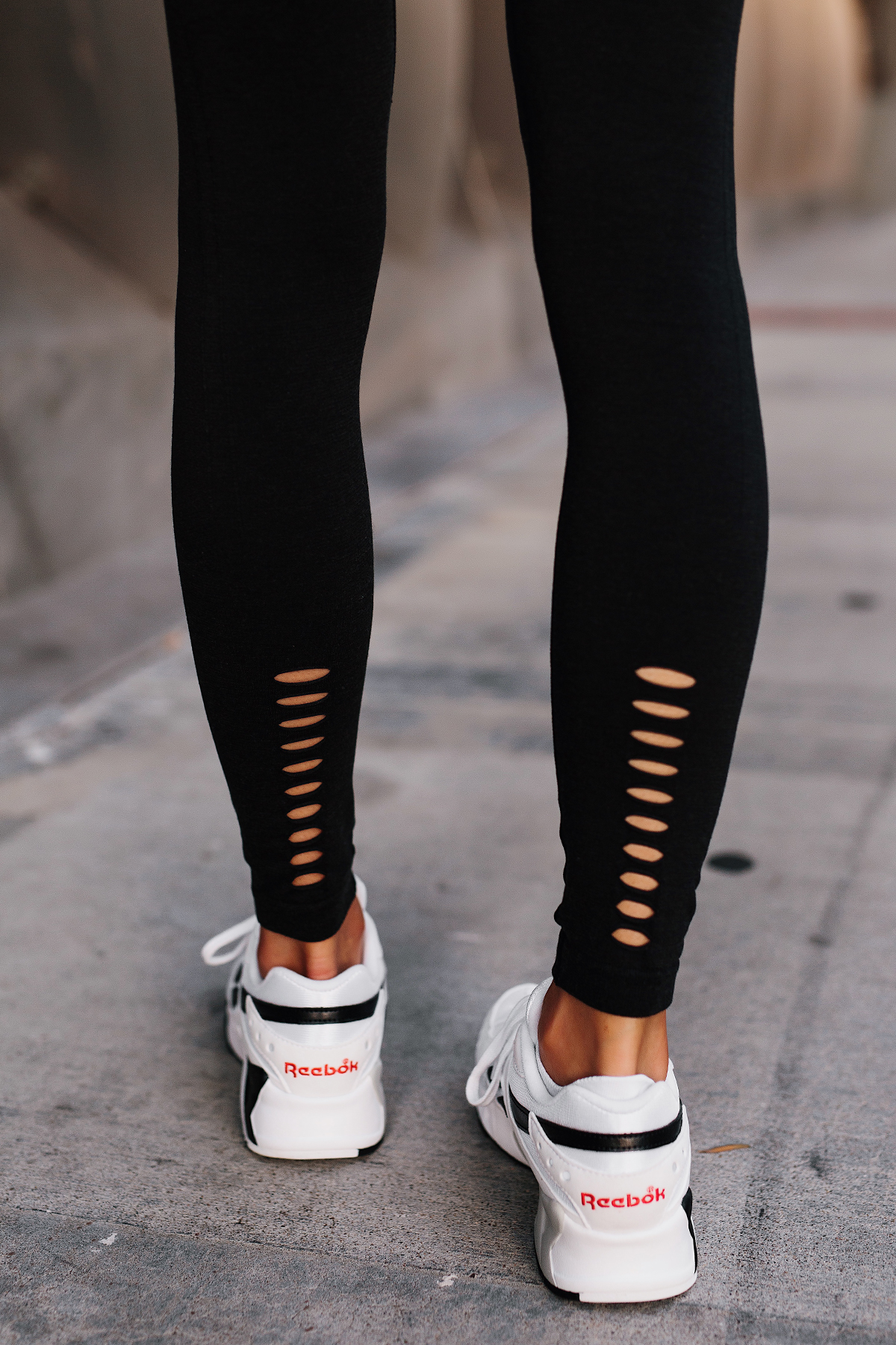 Woman Wearing Reebok Black Leggings Reebok Aztrek Sneakers White Fashion Jackson San Diego Fashion Blogger Activewear Street Style