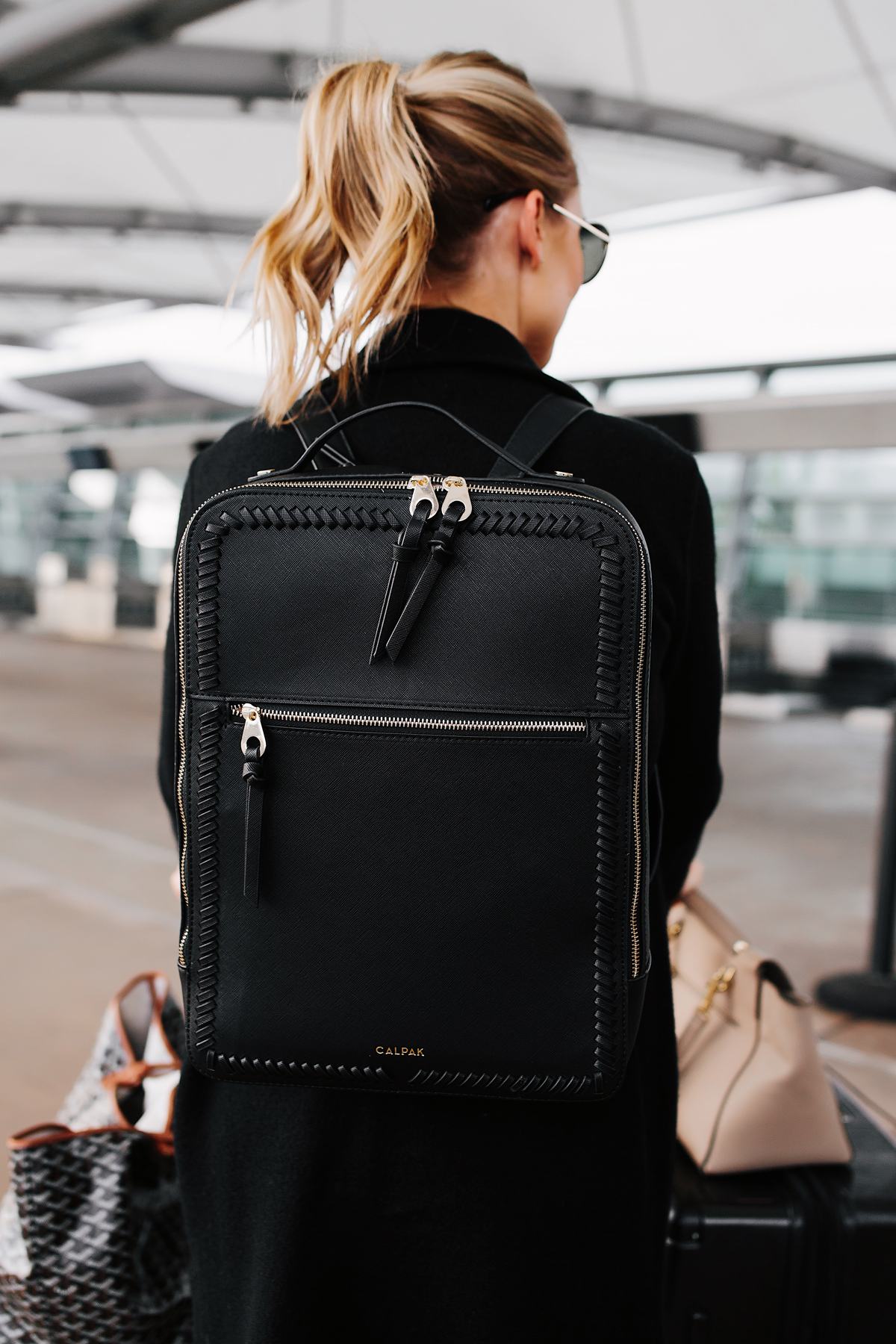 Fashion Jackson Wearing Calpak Kaya Black Backpack Airport Style