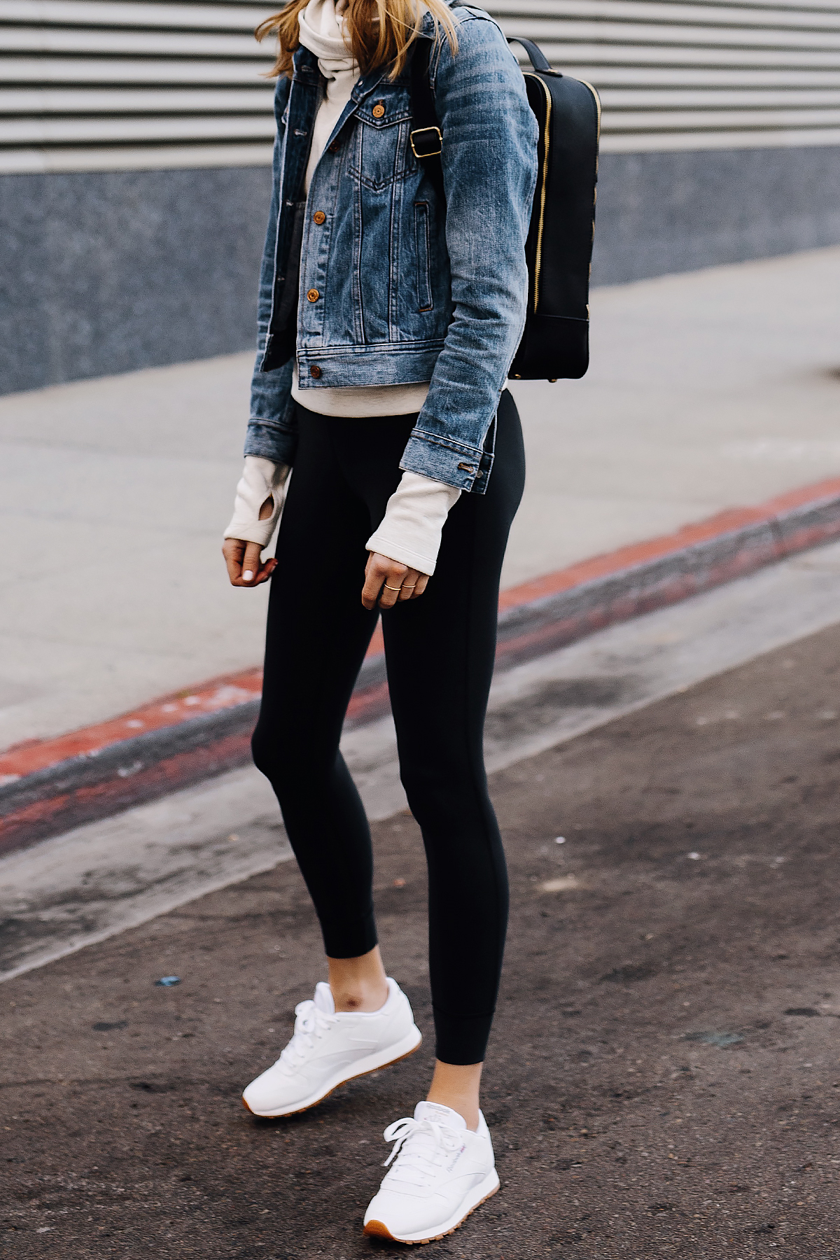 Blonde Woman Wearing Athleisure Outfit Denim Jacket Grey Sweatshirt Black Leggings Reebok Classic White Sneakers Black Fashion Jackson San Diego Fashion Blogger Street Style