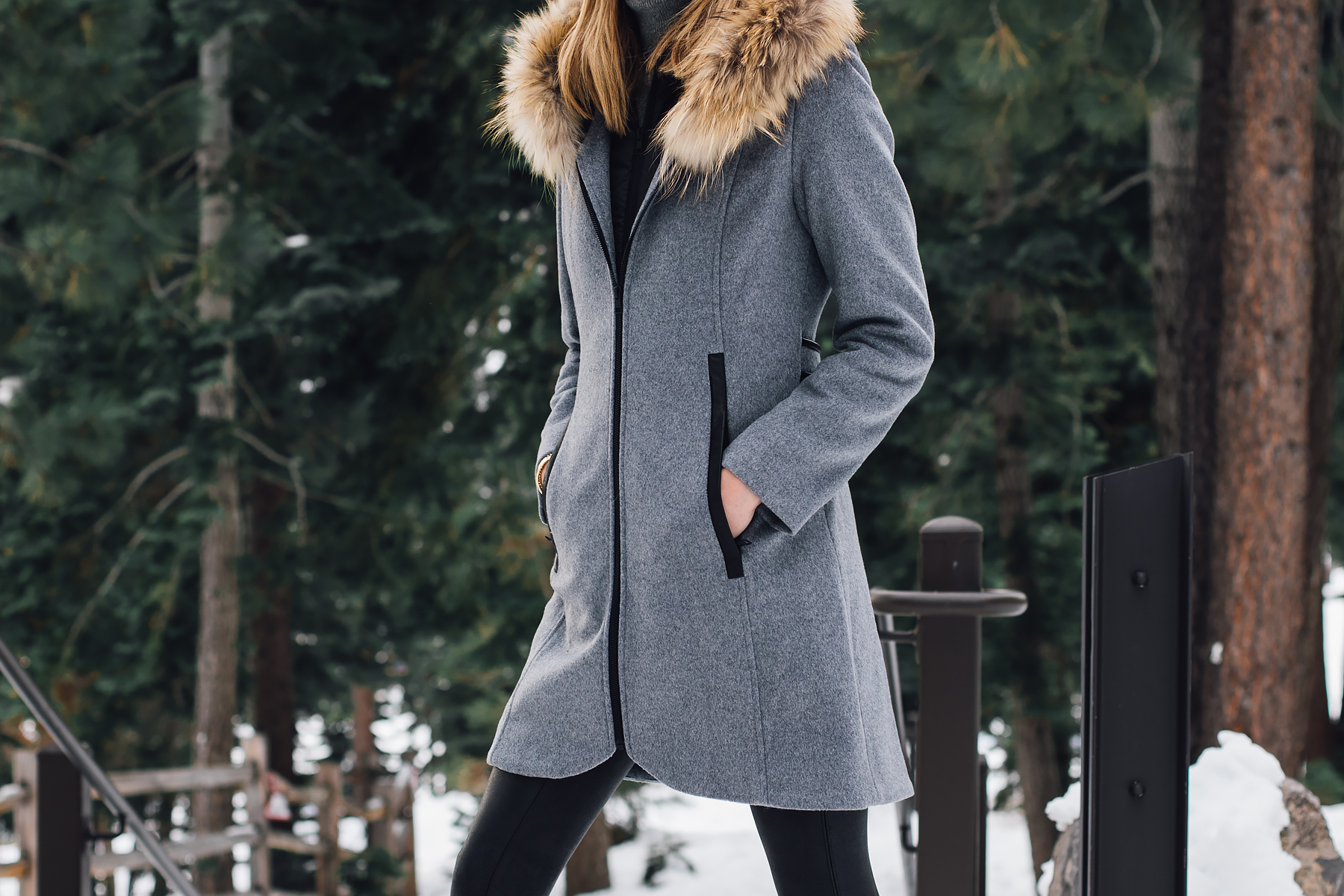 Blonde Woman Wearing Grey Wool Coat with Faux Fur Trim Fashion Jackson San Diego Fashion Blogger Lake Tahoe Winter Outfit