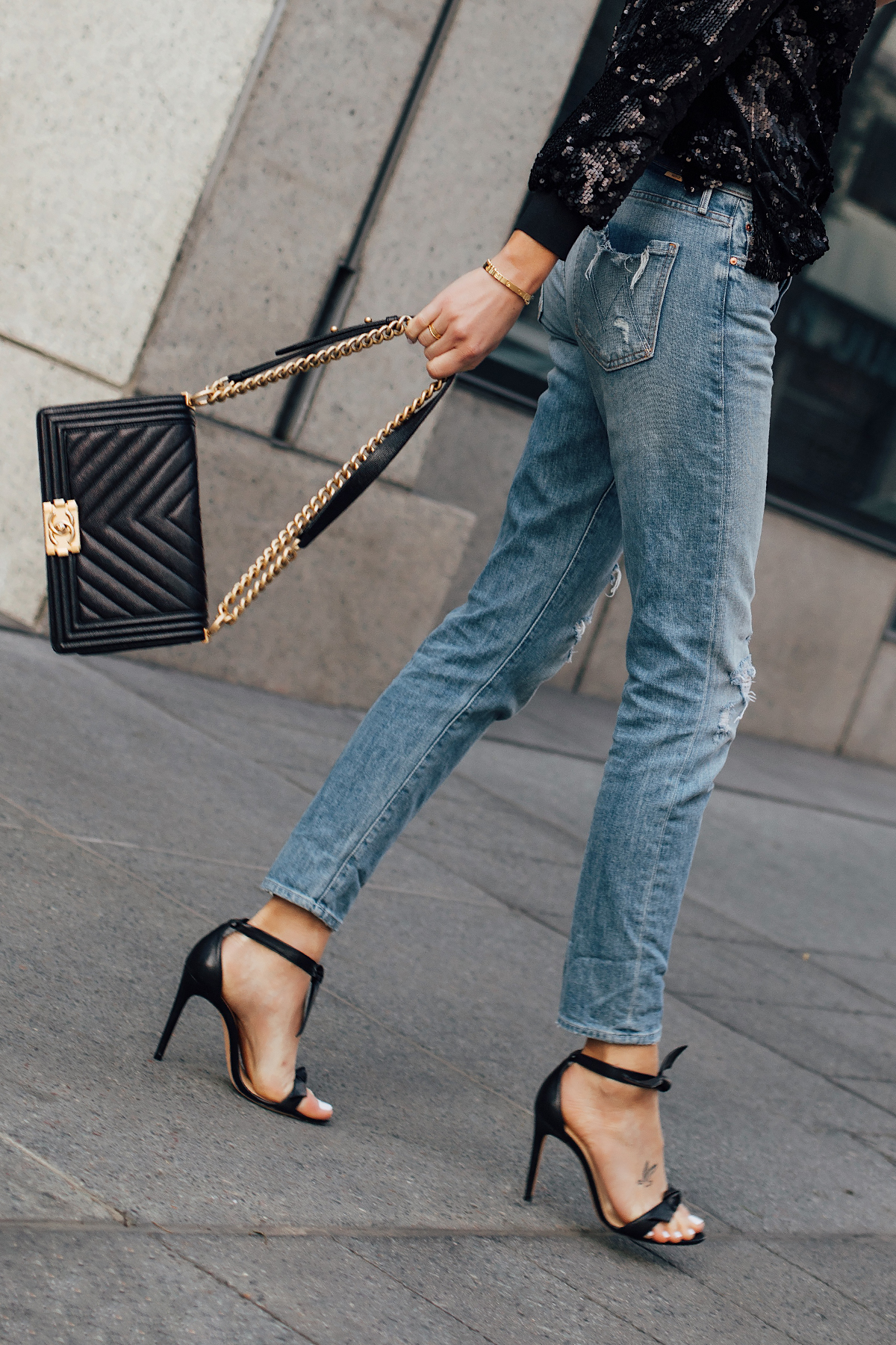 Woman Wearing Black Sequin Top Mother Denim Ripped Jeans Chanel Black Boy Bag Black Heeled Sandals Fashion Jackson San Diego Fashion Blogger Street Style NYE Outift