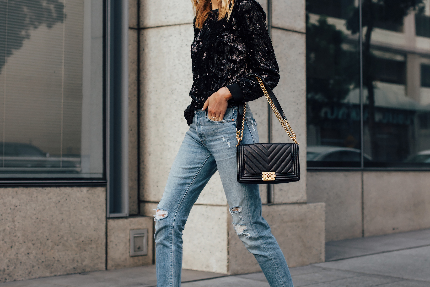 Blonde Woman Wearing Black Sequin Top Ripped Skinny Jeans Chanel Black Boy Bag Fashion Jackson San Diego Fashion Blogger Street Style NYE Outfit