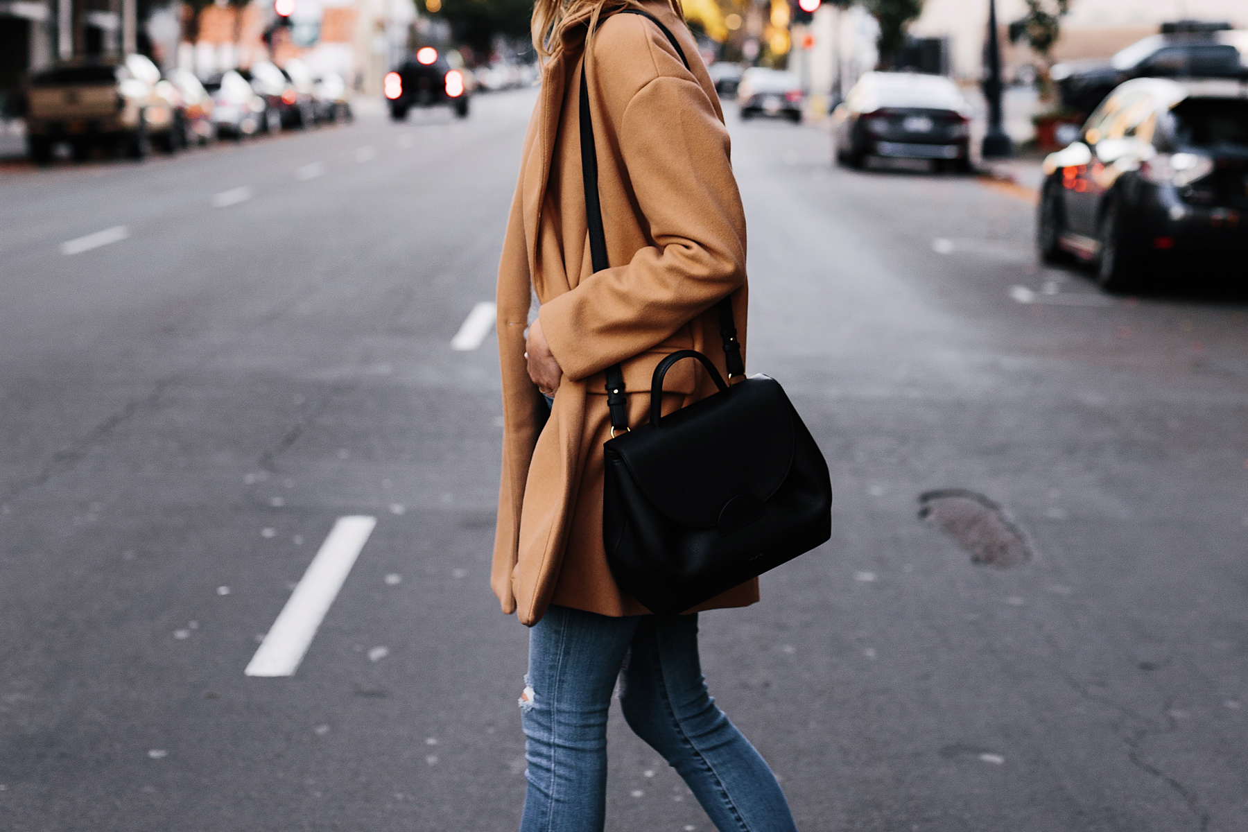 Blonde Woman Wearing Camel Coat Black Satchel Handbag Denim Skinny Jeans Fashion Jackson San Diego Fashion Blogger Street Styke