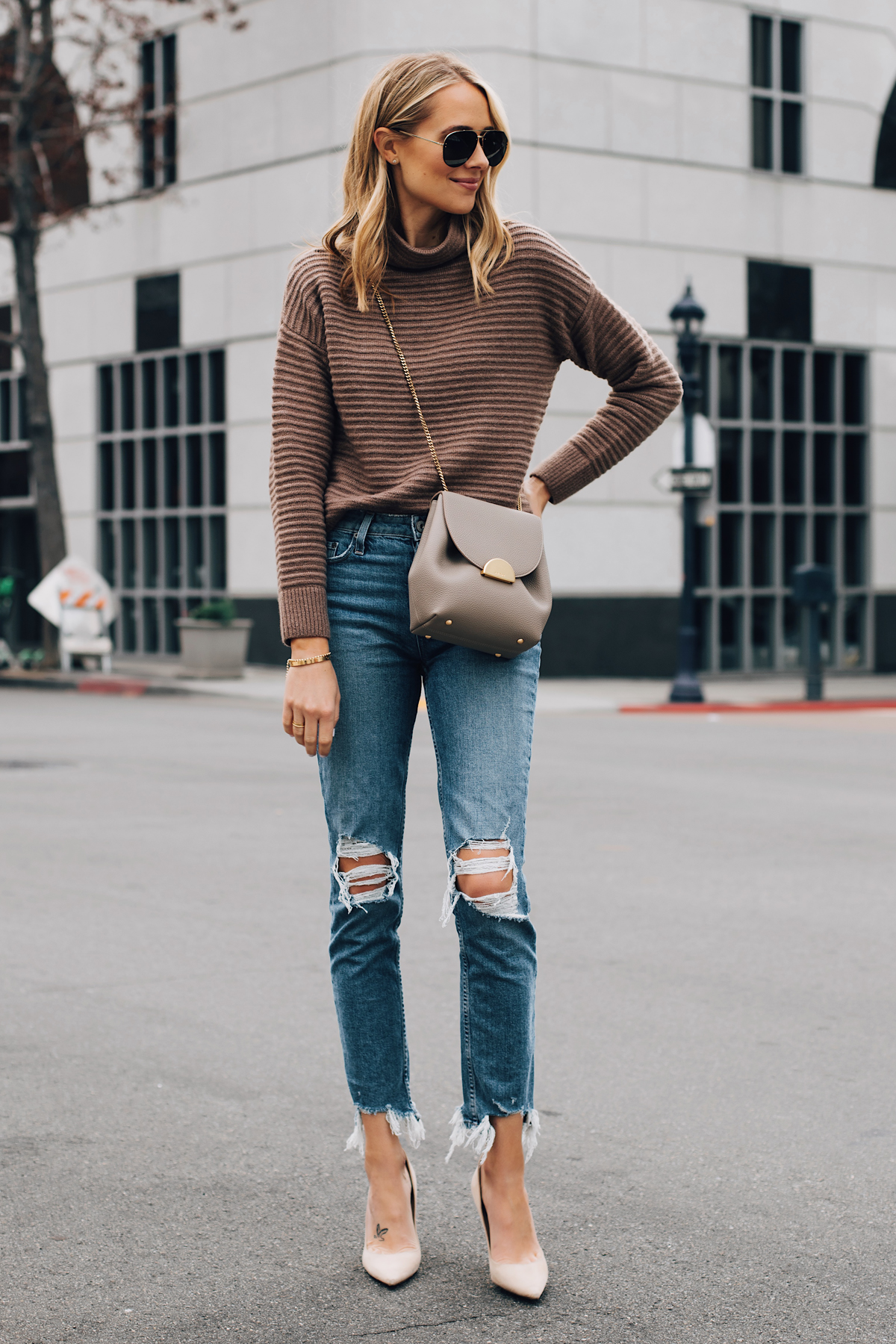 Blonde Woman Wearing Madewell Brown Mock Neck Sweater Paige Ripped Skinny Jeans Nude Pumps Polene Grey Handbag Fashion Jackson San Diego Fashion Blogger Street Style