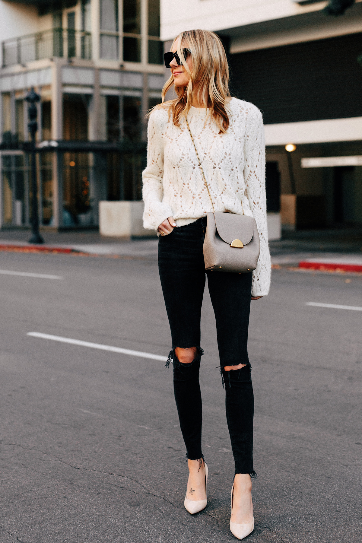 Blonde Woman Wearing Reformation White Pointelle Sweater Madewell Black Ripped Skinny Jeans Polene Grey Handbag Tan Pumps Fashion Jackson San Diego Fashion Blogger Street Style