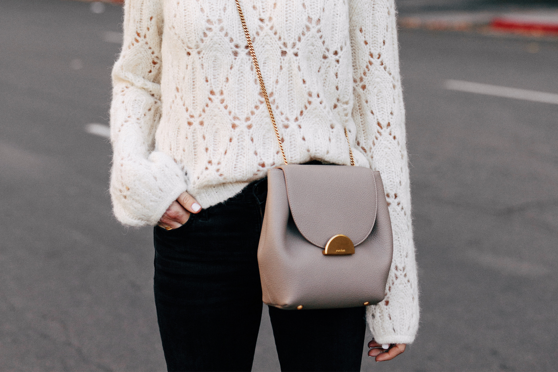 Woman Wearing White Pointelle Sweater Black Skinny Jeans Polene Grey Handbag Fashion Jackson San Diego Fashion Blogger Street Style