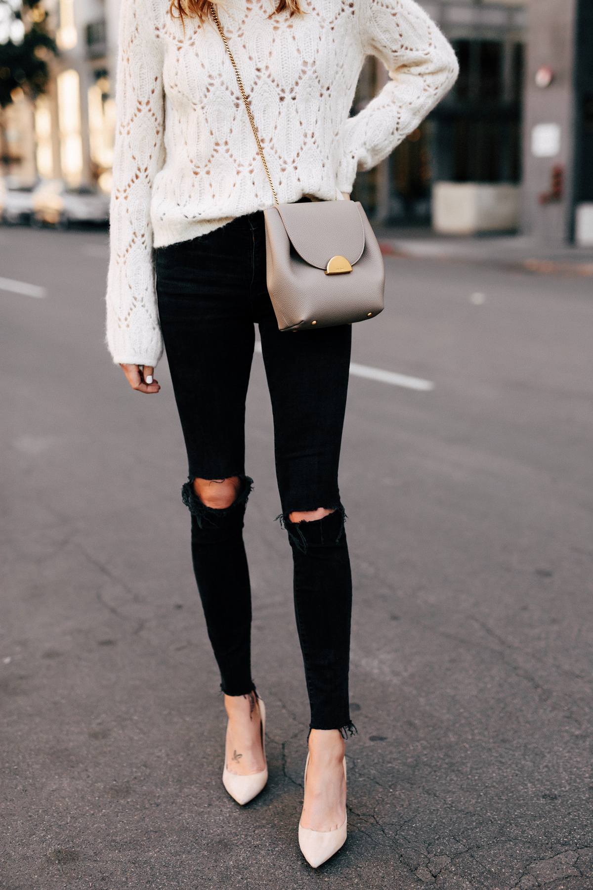 Woman Wearing White Pointelle Sweater Madewell Black Ripped Skinny Jeans Nude Pumps Polene Grey Handbag Fashion Jackson San Diego Fashion Blogger Street Style