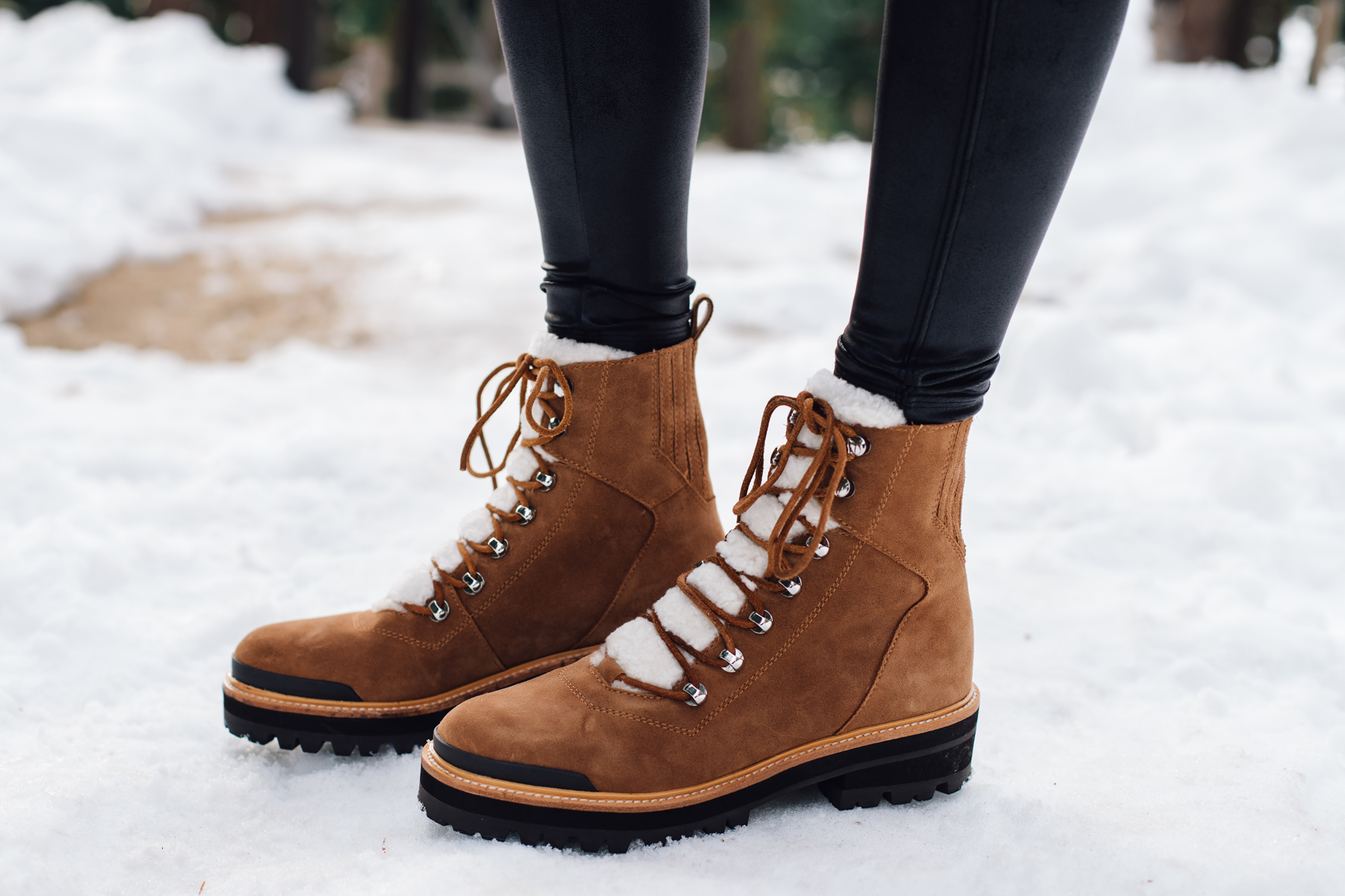 Fashion Jackson wearing Marc Fisher Shearling Brown Lace Up Booties