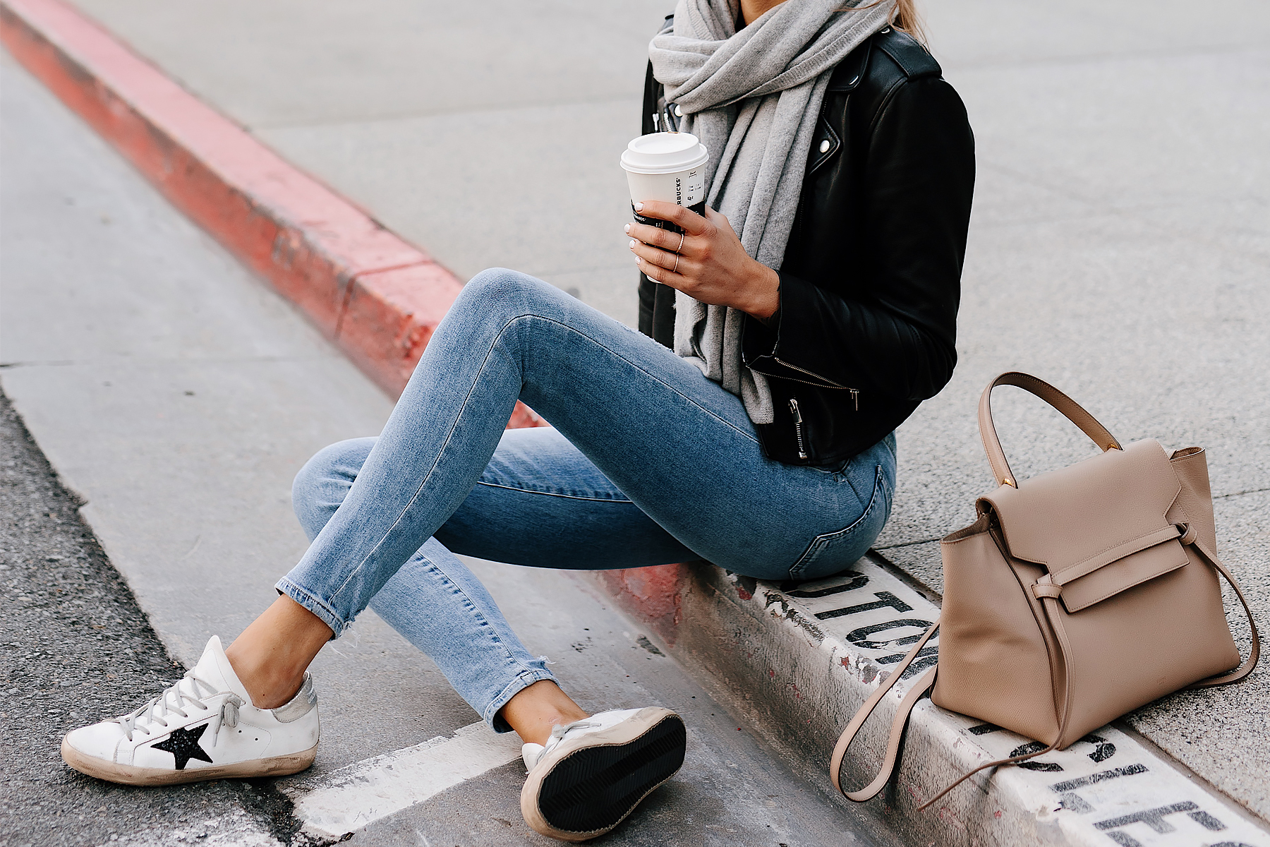 Woman Wearing Black Leather Jacket Grey Scarf Denim Skinny Jeans Golden Goose Sneakers Celine Mini Belt Bag Taupe Fashion Jackson San Diego Fashion Blogger Street Style