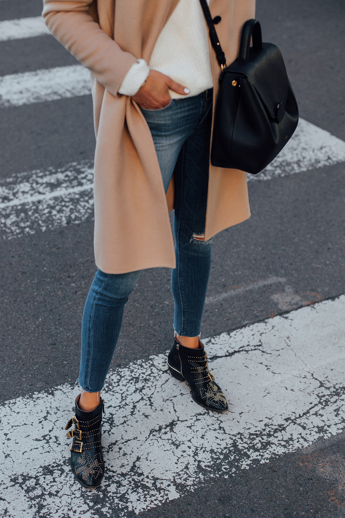 Woman Wearing Camel Coat White Sweater Denim Skinny Jeans Chloe Susanna Booties Polene Black Handbag Fashion Jackson San Diego Fashion Blogger Street Style