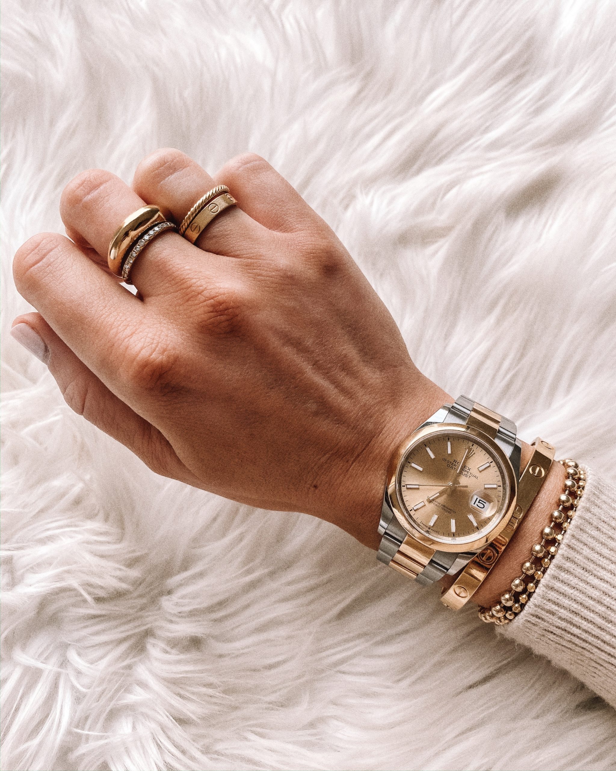 cartier love bracelet with rolex