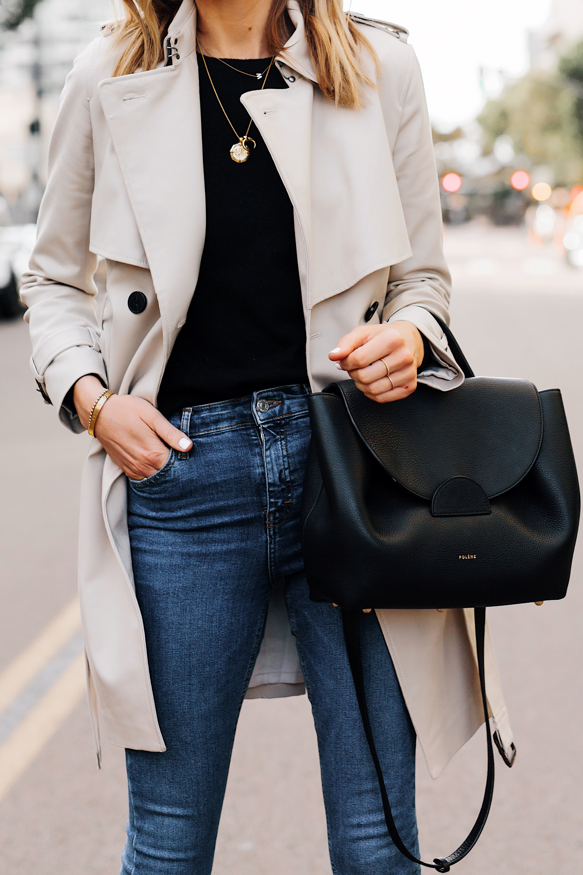 Blonde Woman Wearing Trench Coat Black Sweater Denim Skinny Jeans Polene Number One Handbag Monochrome Black Fashion Jackson San Diego Fashion Blogger Street Style