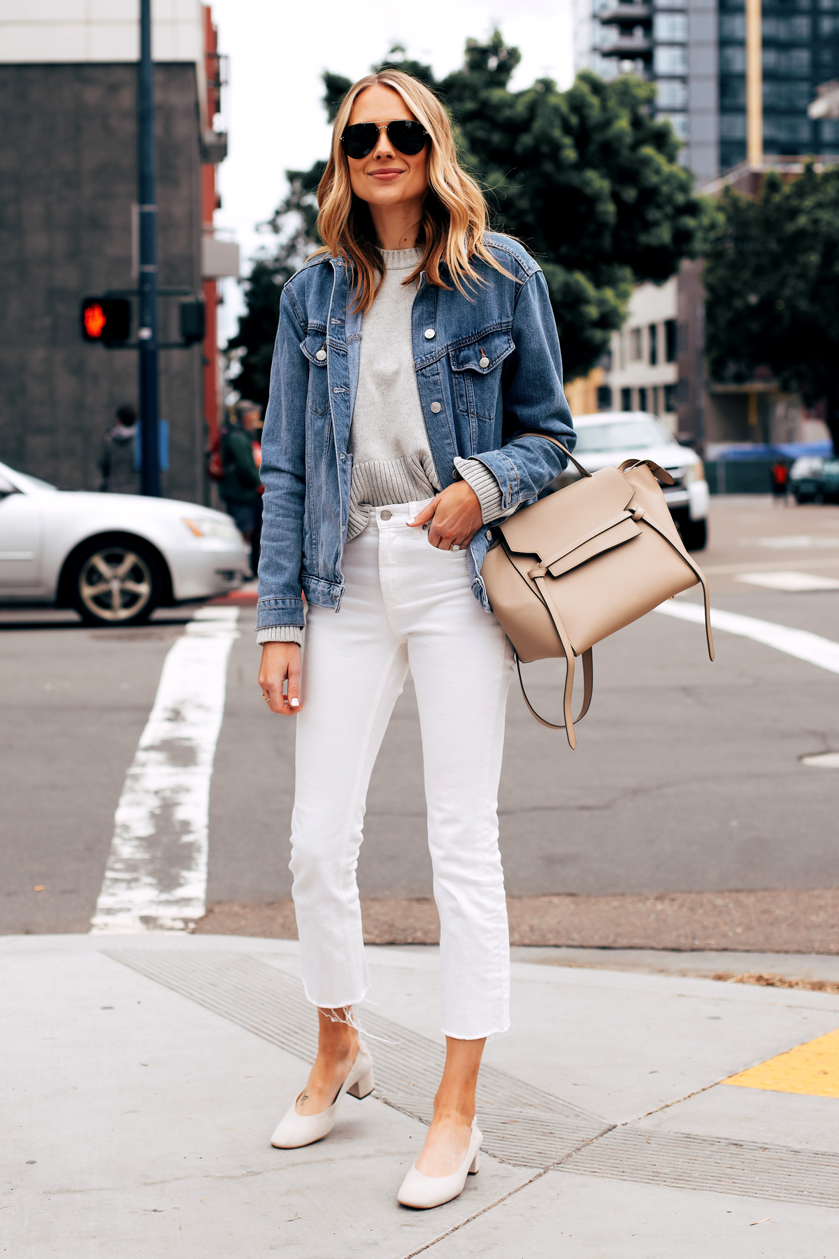 Fashion Jackson Capsule Wardrobe Wearing Topshop Oversized Denim Jacket Grey Sweater Everlane White Cropped Jeans Everlane Day Heel Celine Mini Belt Bag