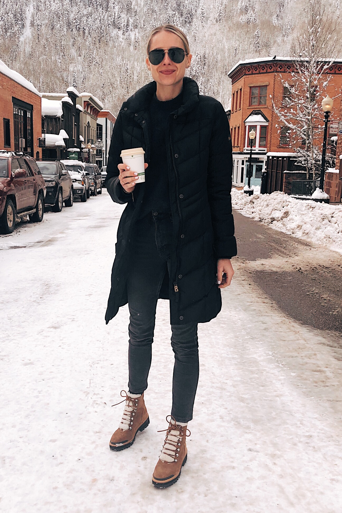 Fashion-Jackson-Wearing-Bogner-Black-Puffer-Jacket-Grey-Skinny-Jeans-Marc-Fisher-Winter-Boots