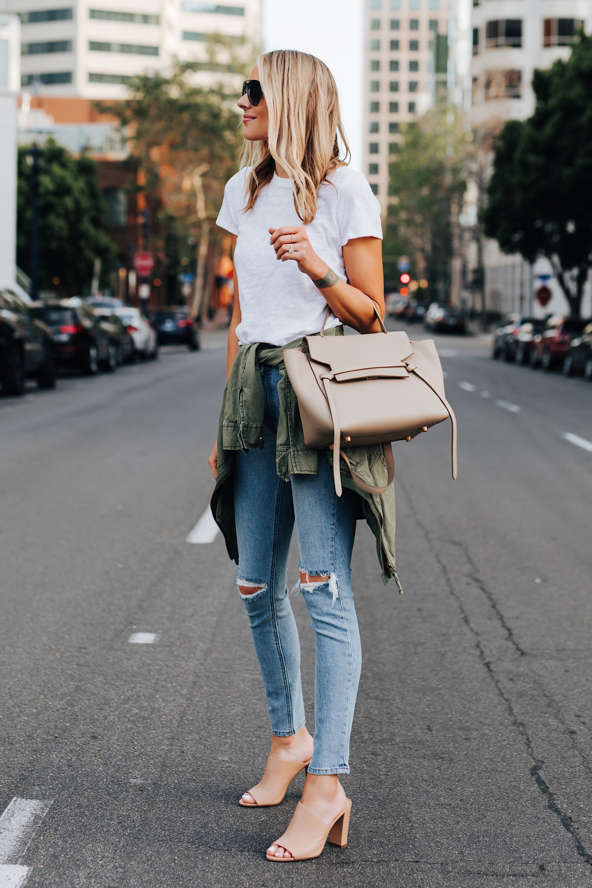 Blonde Woman Wearing ATM White Tshirt Ripped Skinny Jeans Green Utility Jacket Vince Hanna Nude Heeled Mules Celine Mini Belt Bag Fashion Jackson San Diego Fashion Blogger Street Style