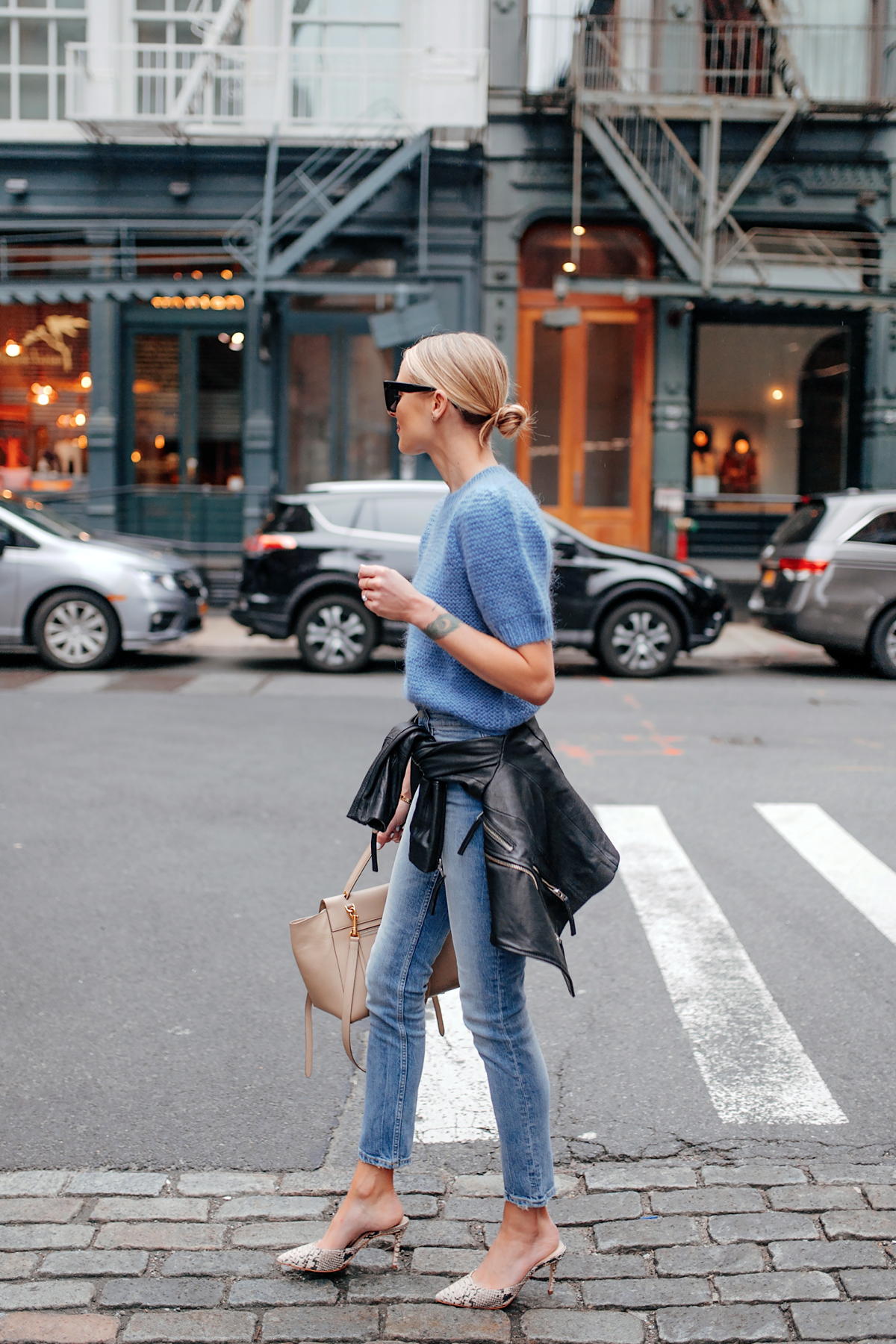 Blonde Woman Wearing Anine Bing Nicolette Blue Sweater Denim Skinny Jeans Black Leather Jacket Snakeskin Mules Fashion Jackson San Diego Fashion Blogger New York Street Style