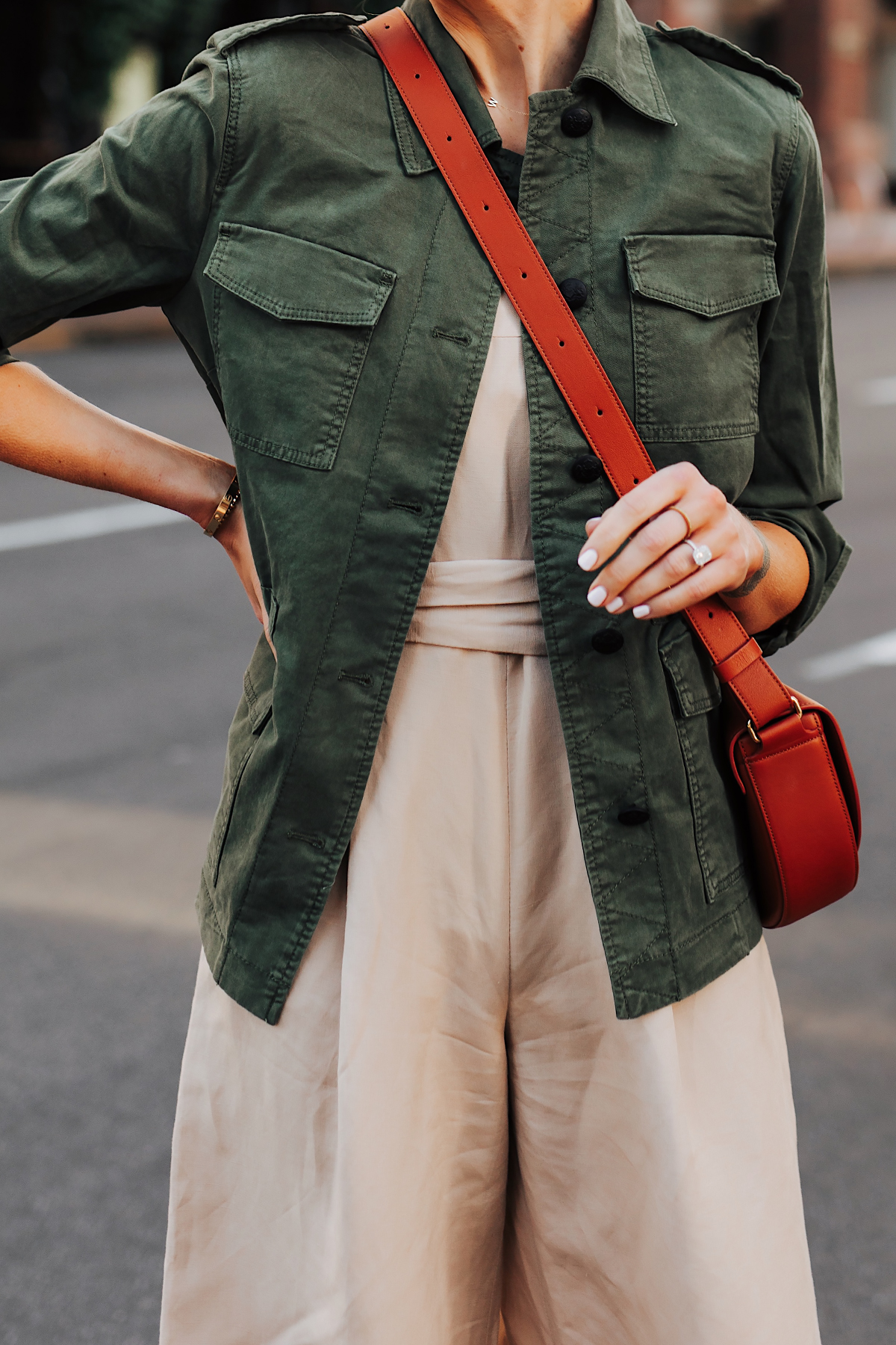 Woman Wearing Banana Republic Beige Linen Jumpsuit Green Utility Jacket Tan Crossbody Handbag Fashion Jackson San Diego Fashion Blogger Street Style