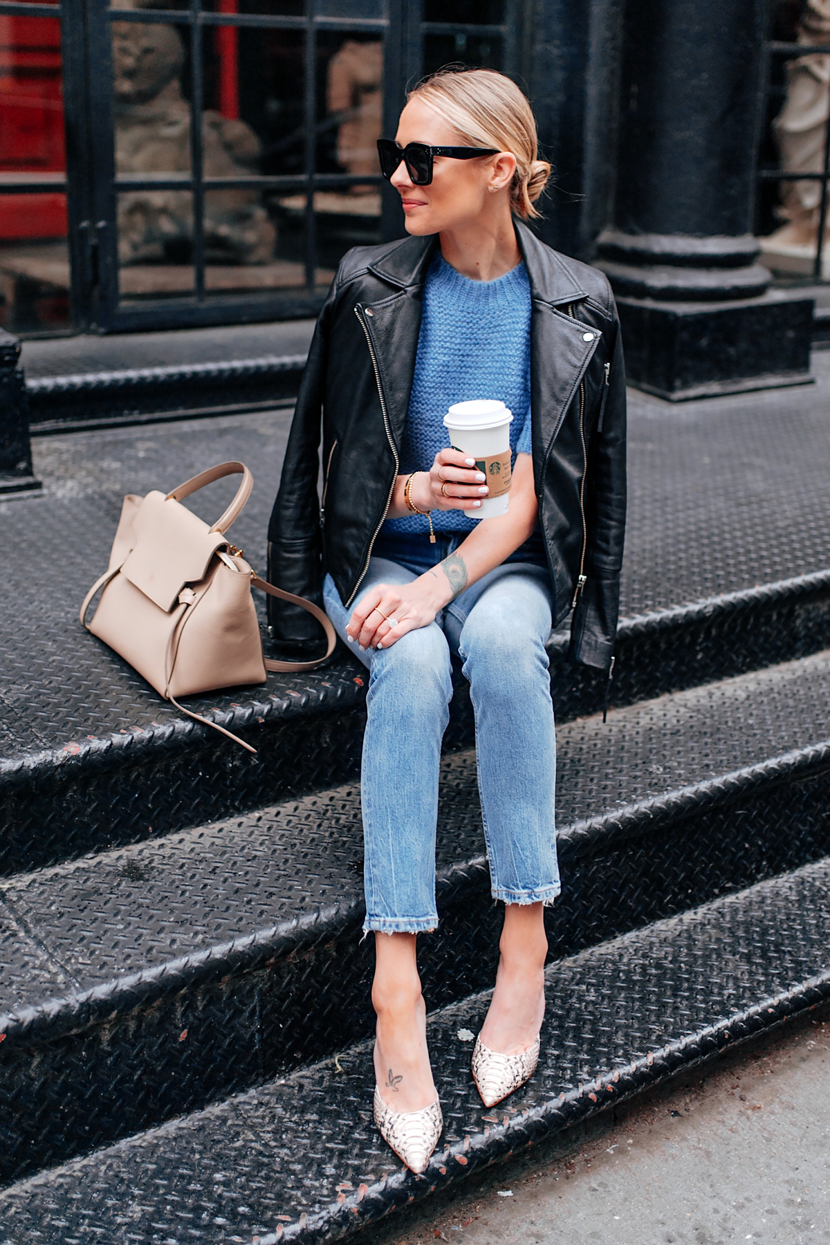 Blonde Woman Wearing Black Leather Jacket Anine Bing Nicolette Blue Sweater Denim Skinny Jeans Snakeskin Mules Celine Mini Belt Bag Fashion Jackson San Diego Fashion Blogger New York Street Style