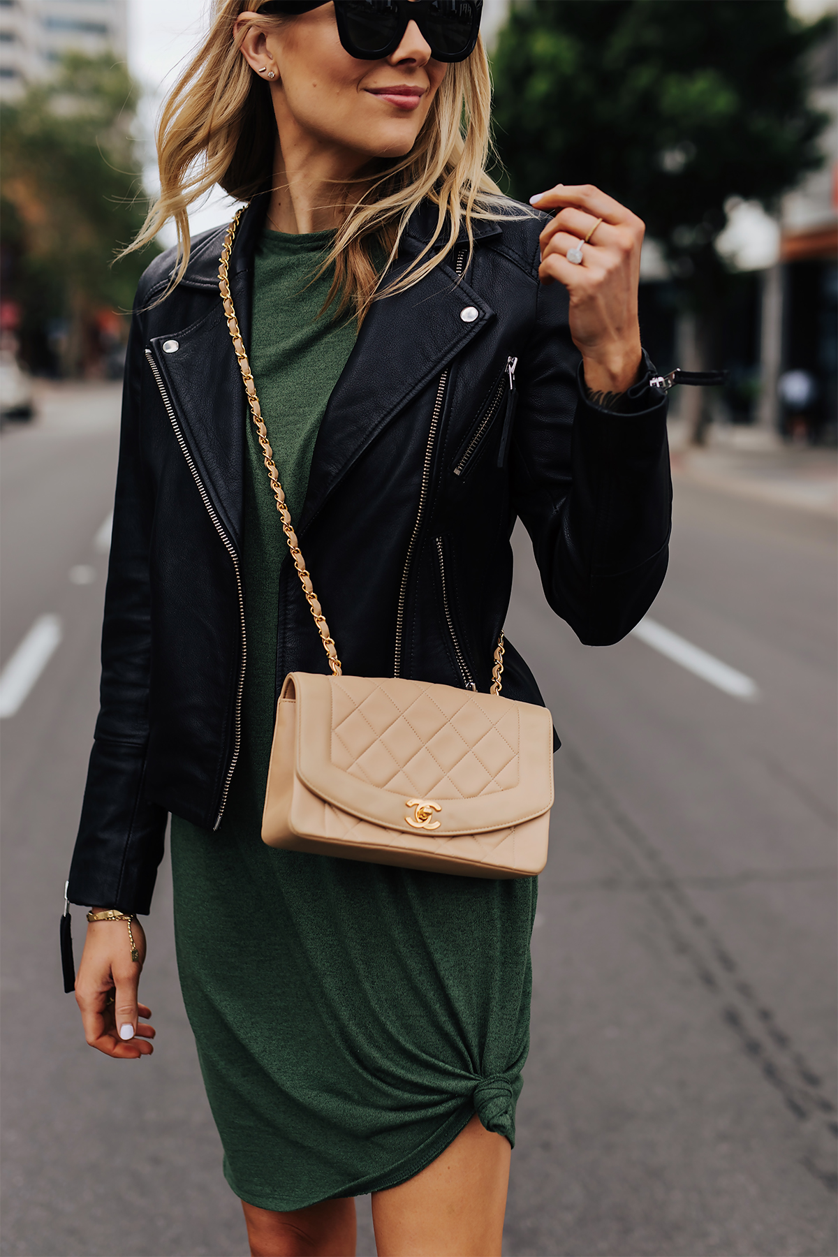 Blonde Woman Wearing Green Tshirt Dress Black Leather Jacket Chanel Beige Crossbody Fashion Jackson San Diego Fashion Blogger Street Style