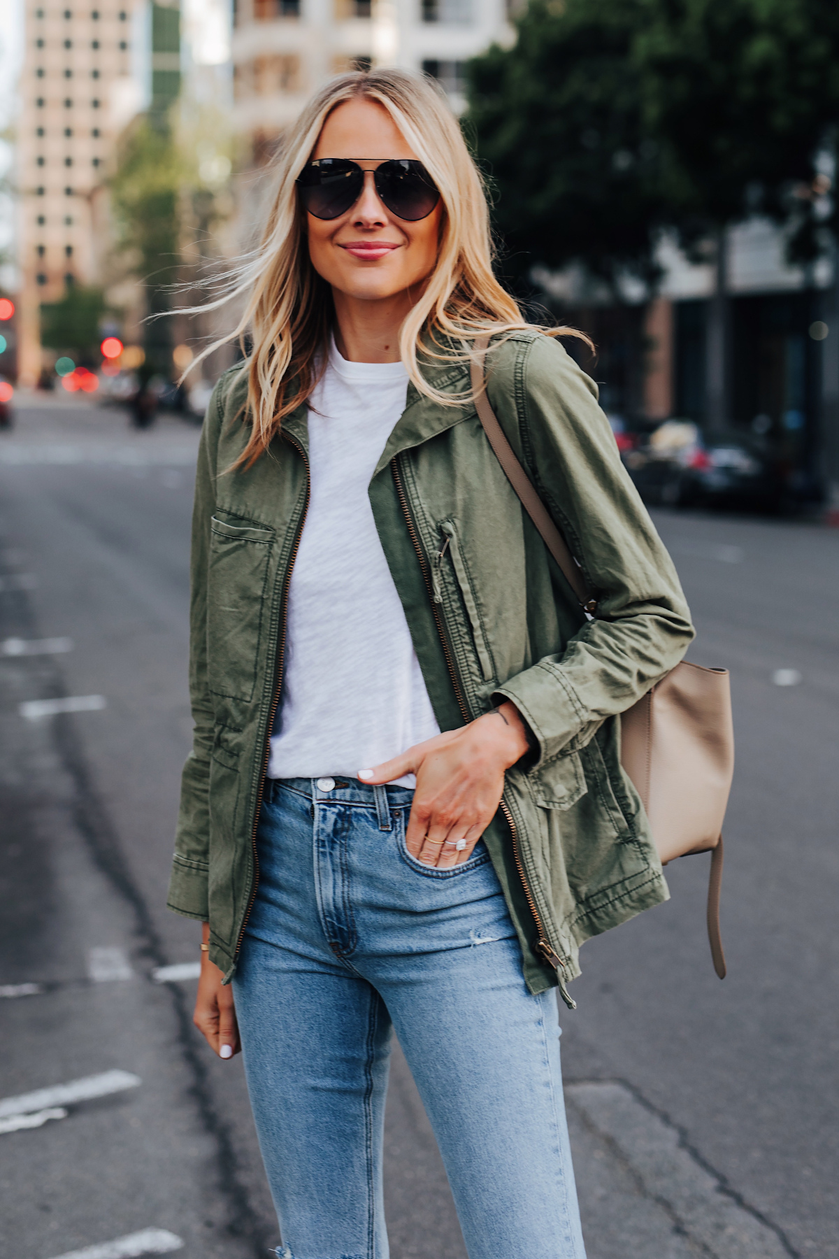 Blonde Woman Wearing Madewell Green Utility Jacket White Tshirt Skinny Jeans Black Aviator Sunglasses Fashion Jackson San Diego Fashion Blogger Street Style