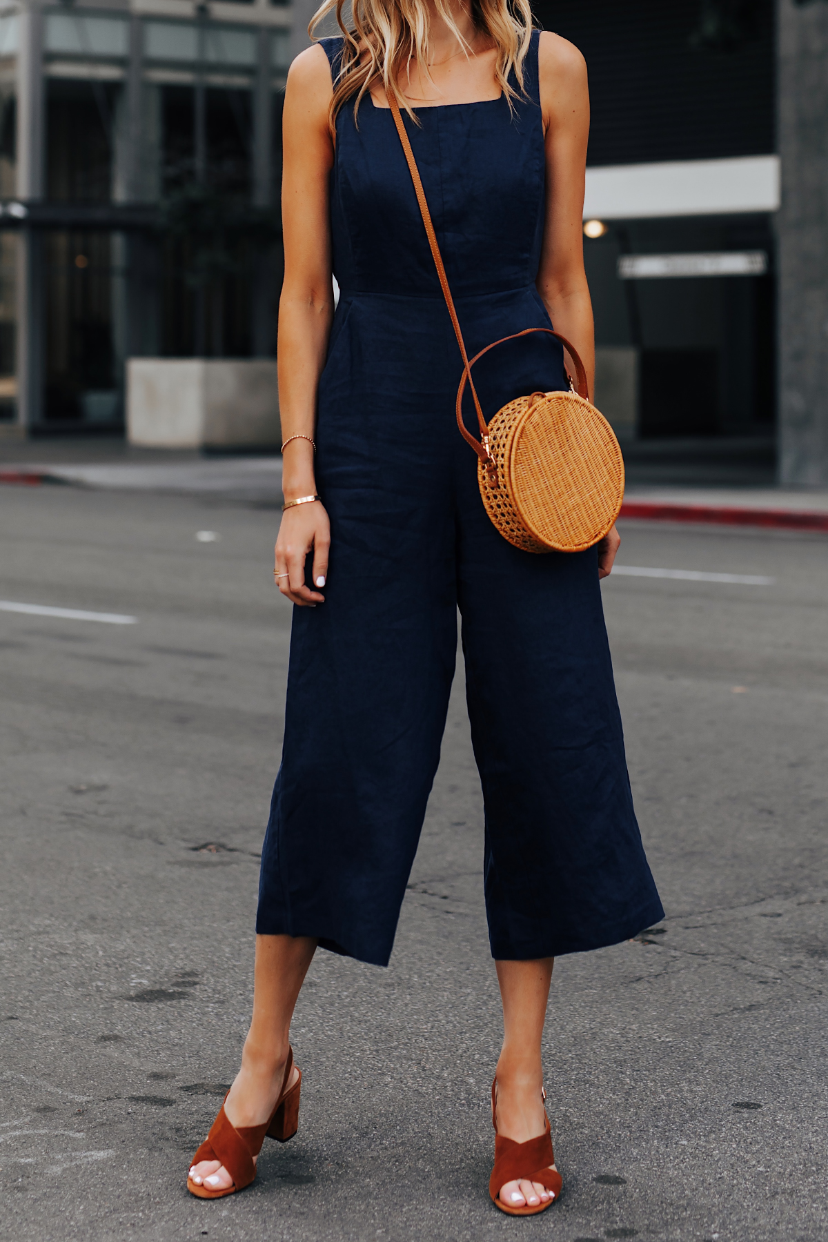 Woman Wearing Navy Jumpsuit Brown Suede Sandals Circle Basket Bag Fashion Jackson San Diego Fashion Blogger Street Style