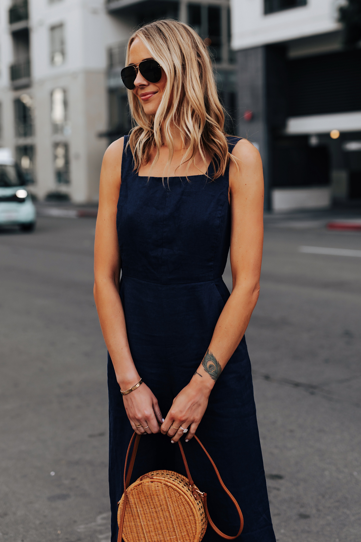 Blonde Woman Wearing Navy Jumpsuit Circle Basket Bag Fashion Jackson San Diego Fashion Blogger Street Style