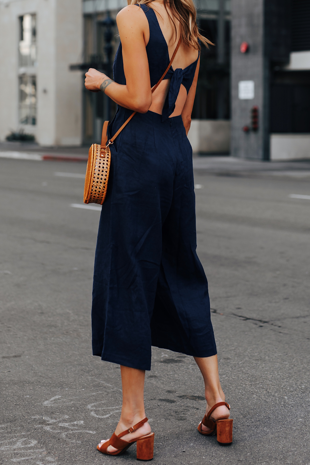 Woman Wearing Navy Open Back Jumpsuit Brown Suede Sandals Circle Basket Bag Fashion Jackson San Diego Fashion Blogger Street Style