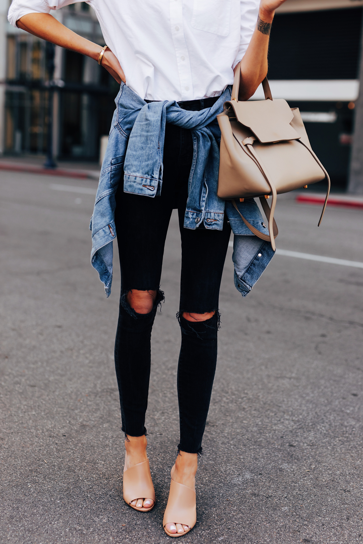 black ripped jeans white shirt