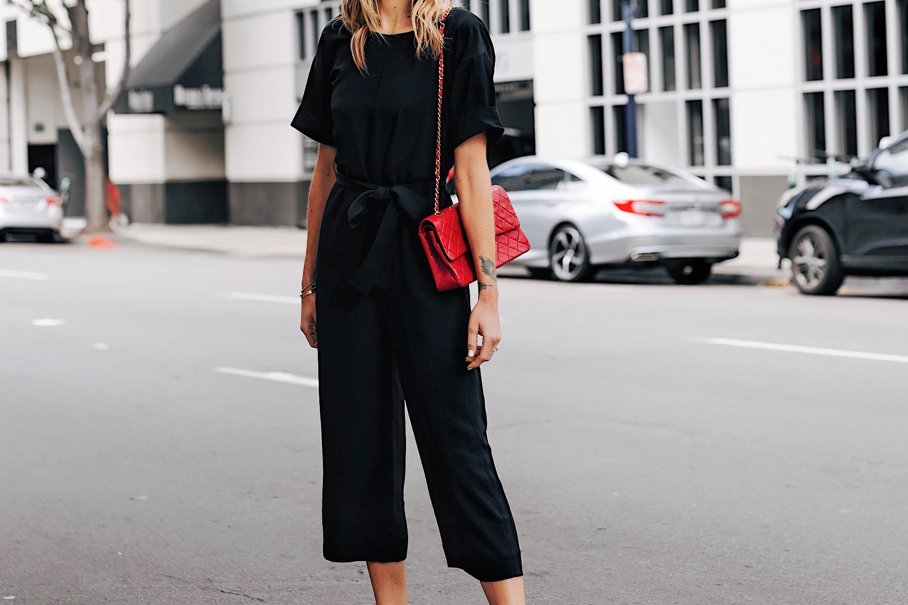 Black jumpsuit store red shoes