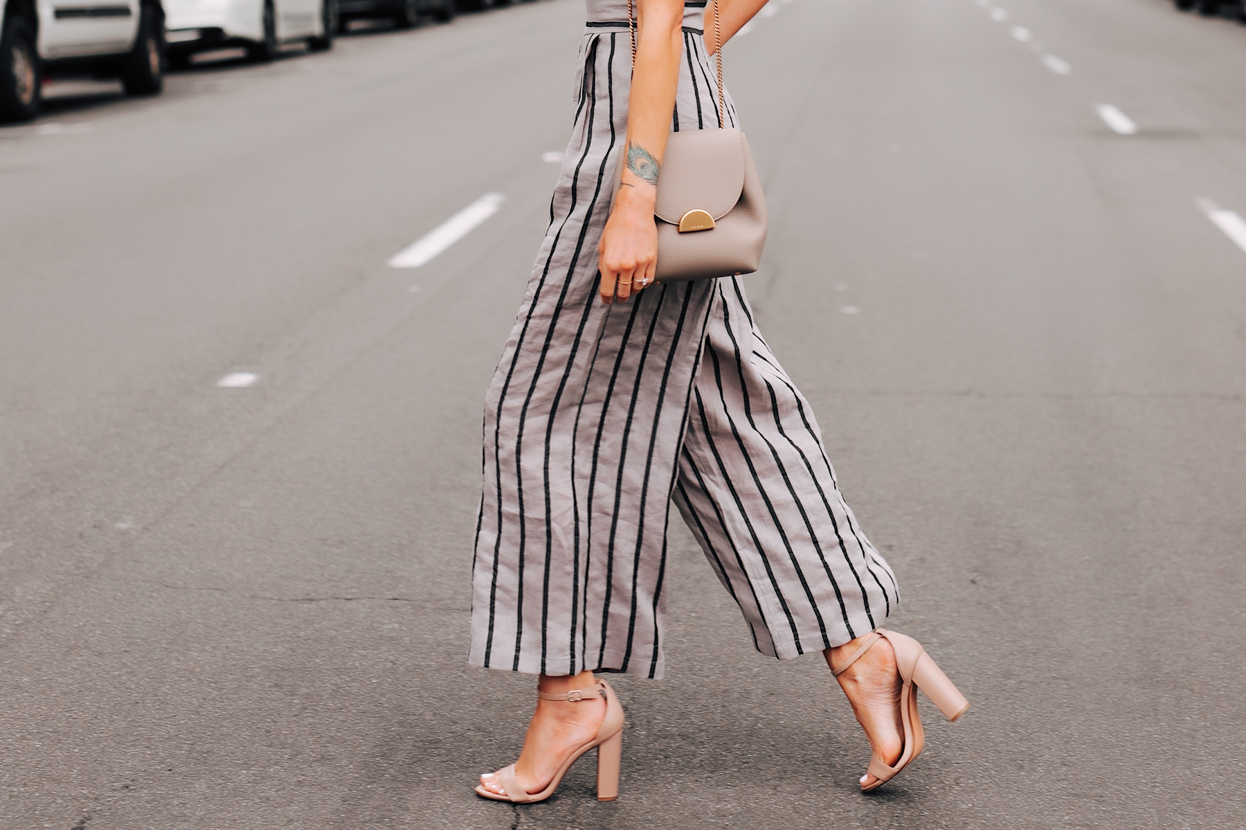 Woman Wearing Jing Grey Strapless Stripe Jumpsuit Tan Ankle Strap Heeled Sandals Grey Shoulder Handbag Fashion Jackson San Diego Fashion Blogger Street Style