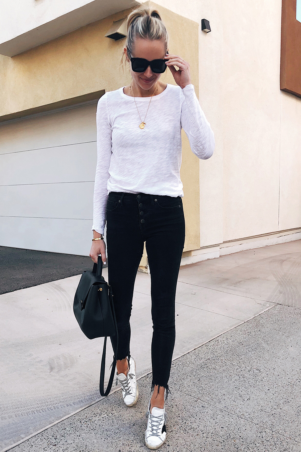 black jeans and sneakers outfit