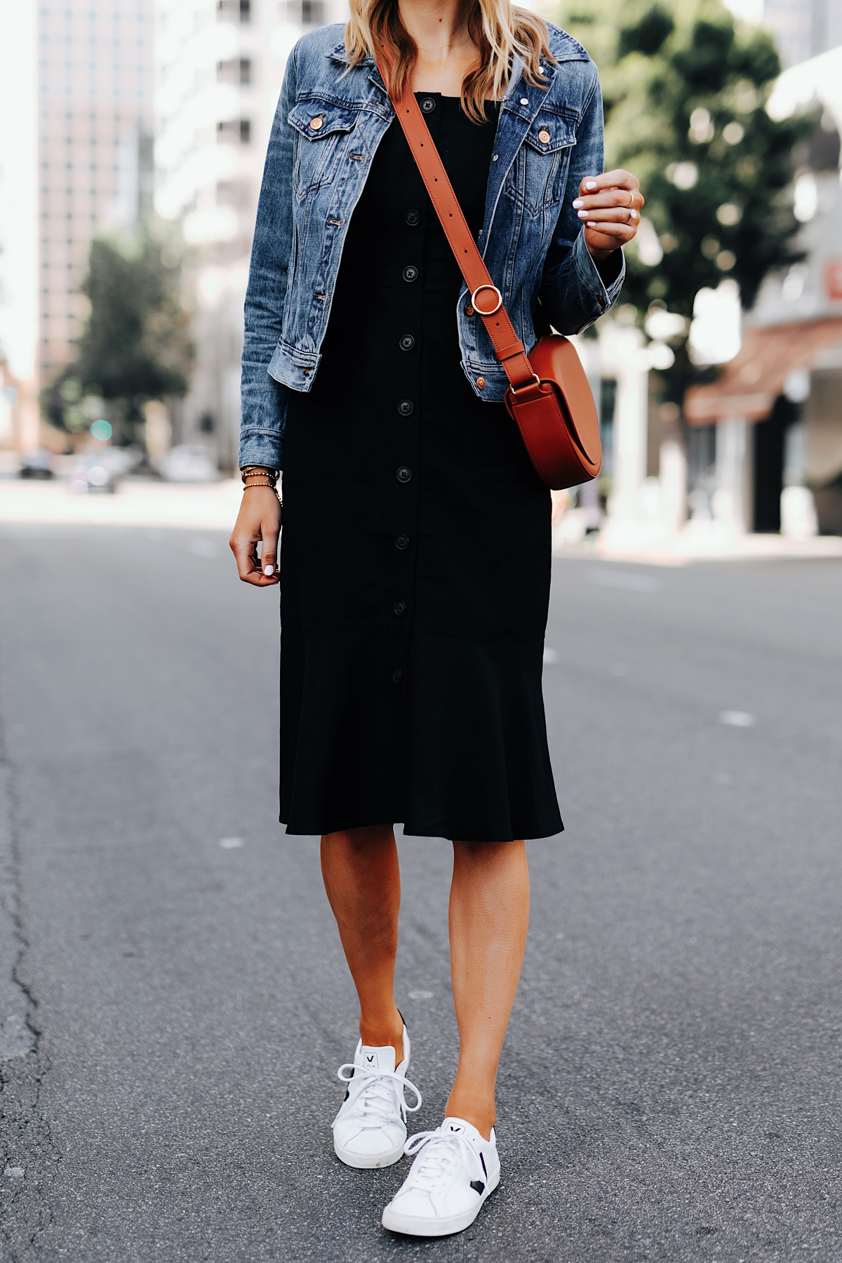 Fashion Jackson Wearing Banana Republic Black Button Front Dress Denim Jacket Tan Crossbody Handbag White Sneakers