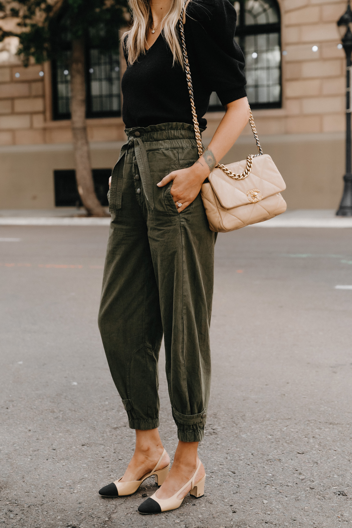 Fashion Jackson Wearing Black Puff Sleeve Sweater Olive Green Trousers Chanel Slingbacks non jeans work outfit for women