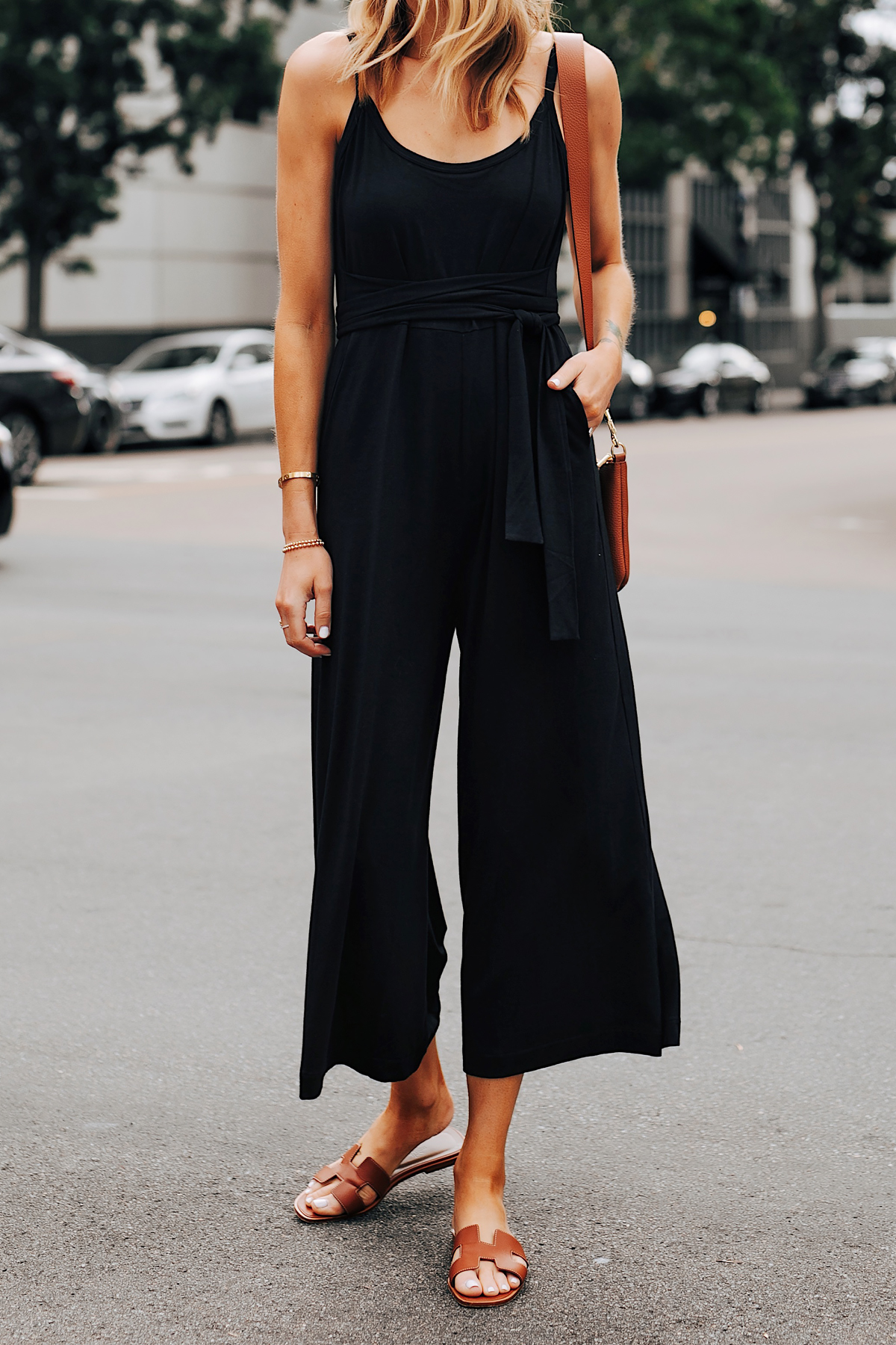 Fashion Jackson Wearing Cuyana Black Jumpsuit Hermes Oran Gold Sandals