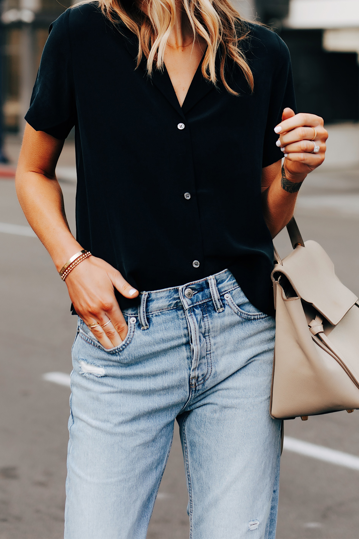 Fashion Jackson Wearing Everlane Black Silk Button Down Short Sleeve Top Ripped Jeans