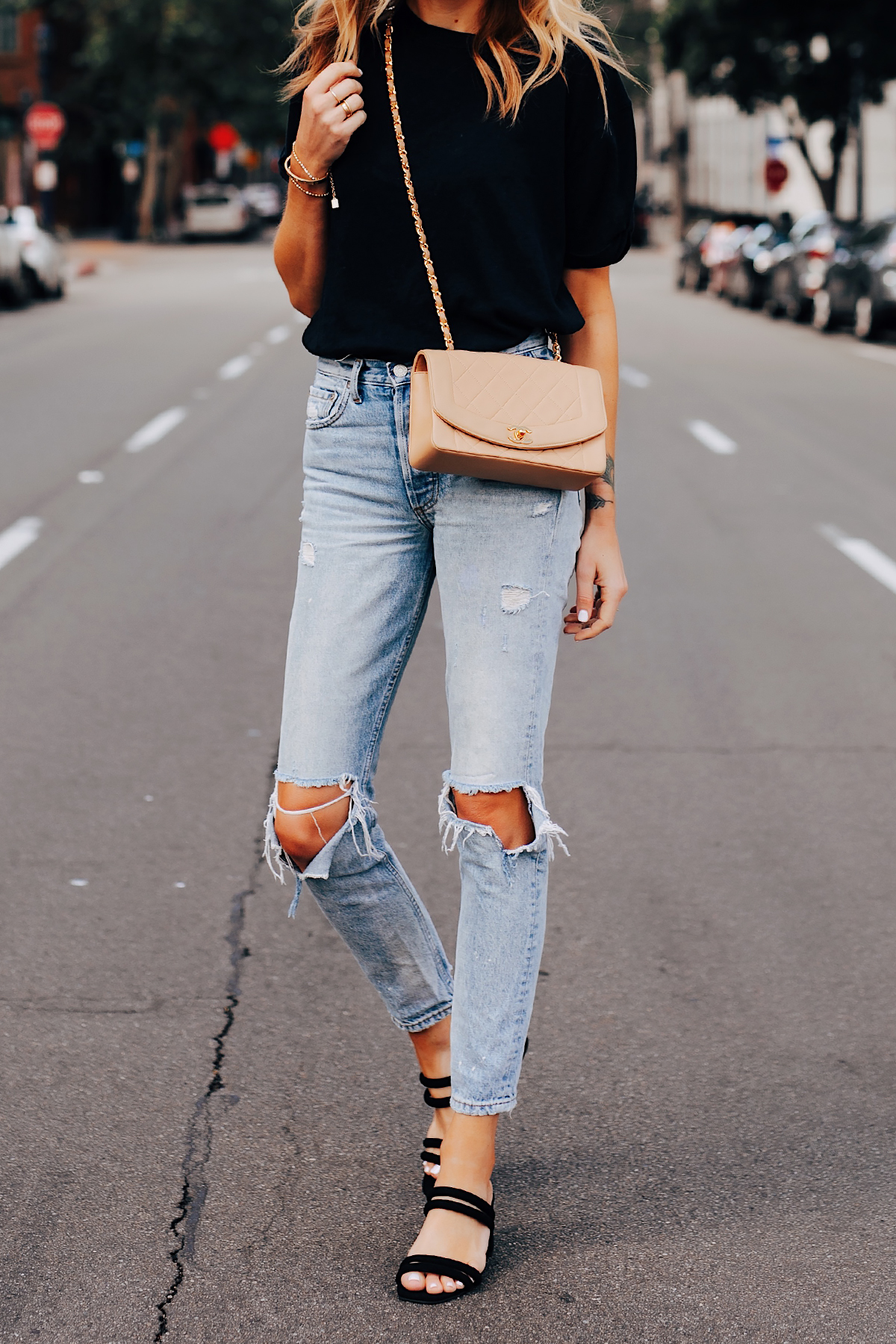 black t shirt and grey jeans