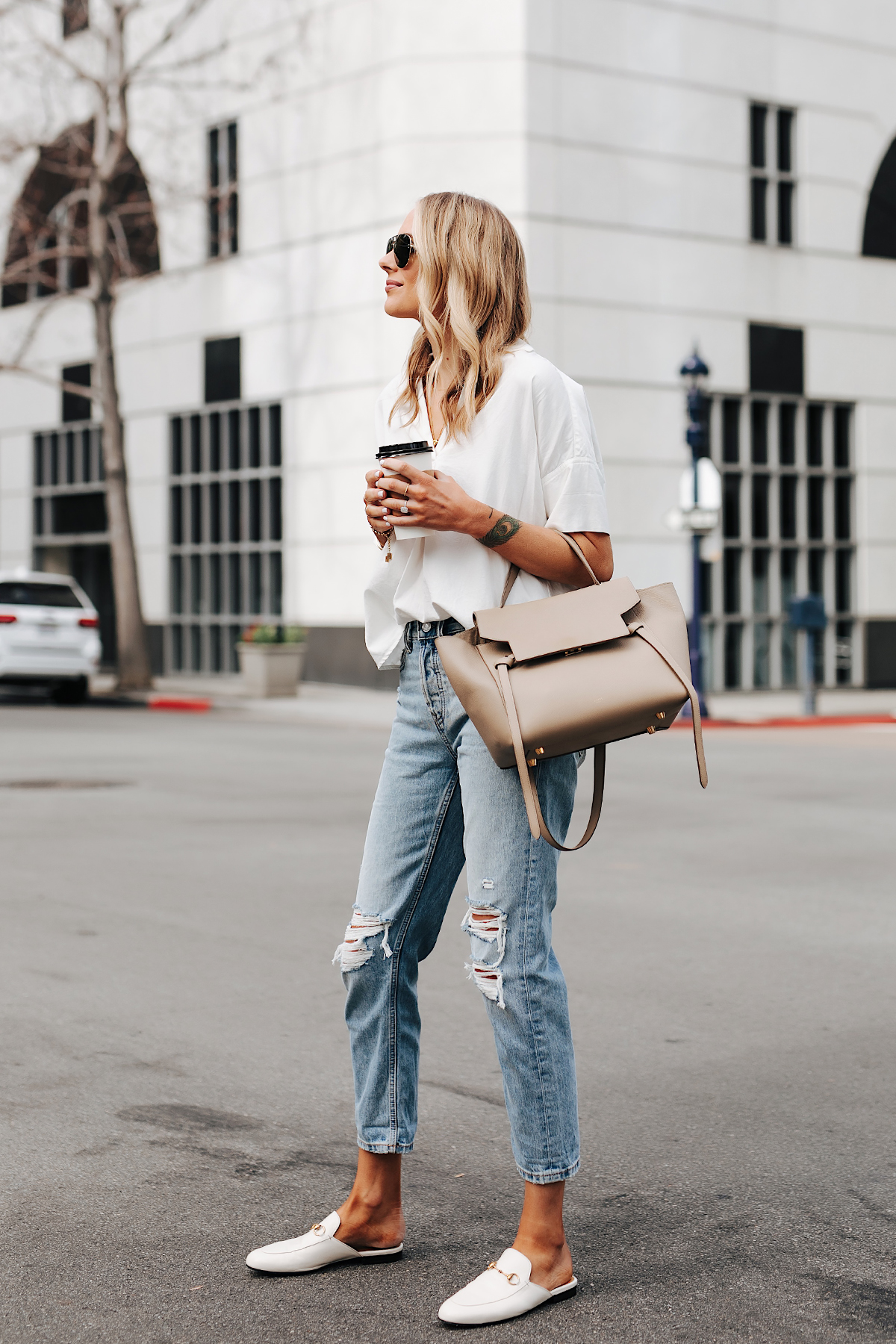 Fashion Jackson Wearing Madewell Short Sleeve White Shirt Everlane Ripped Boyfriend Jeans Gucci Princetown White Mules Celine Belt Bag