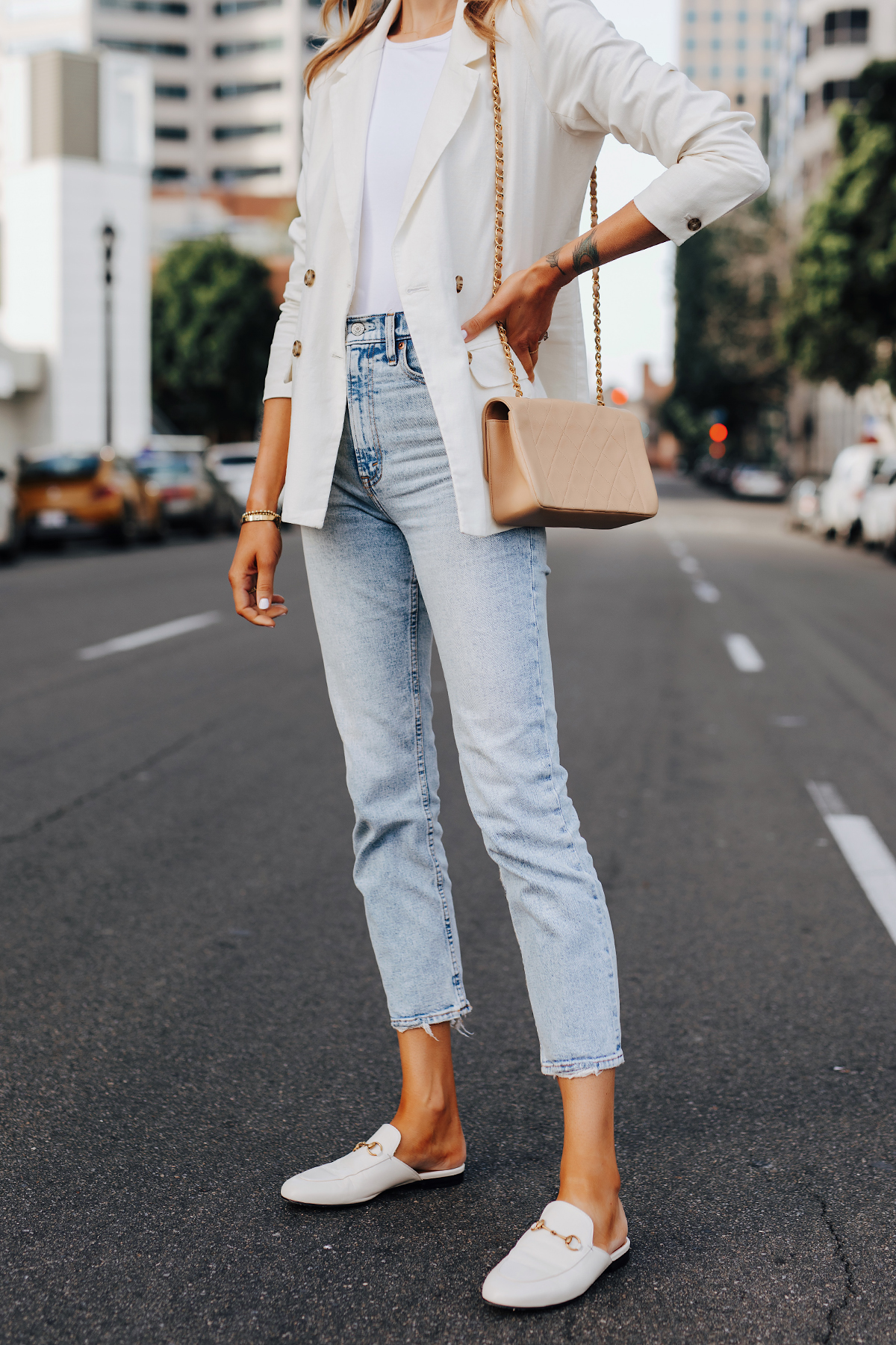 HOSS Intropia beige poncho with white jeans, white jeans and nude Christian  Louboutin pumps, white jeans and camel scarf winter outfit, Louis Vuitton  beige bag - Meagan's Moda