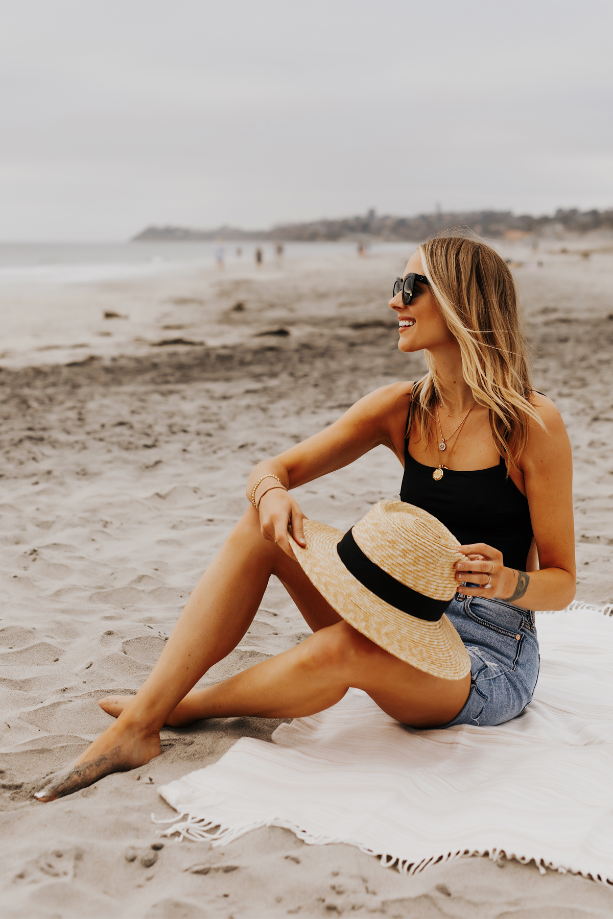 Fashion Jackson Wearing L Space Black One Piece Swimsuit Denim Shorts Brixton Straw Hat San Diego Beach Weekend