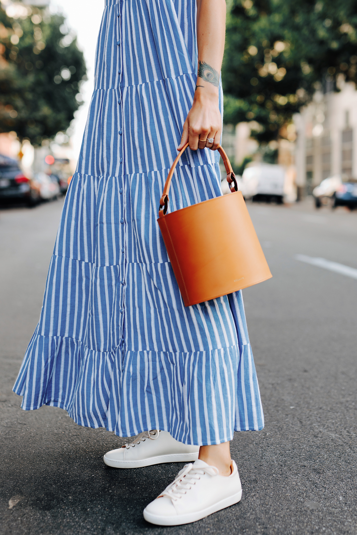 Fashion Jackson Wearing Sezane Blue White Stripe Maxi Dress White Sneakers Cognac Bucket Bag 3