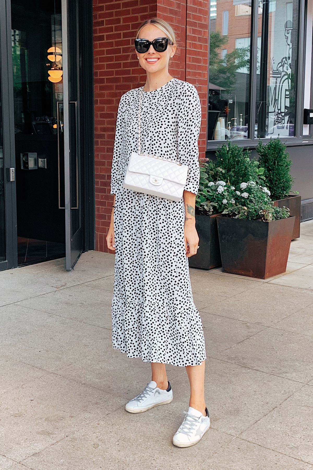 Fashion Jackson Wearing Zara Black and White Polka Dress Golden Goose Sneakers White Chanel Handbag