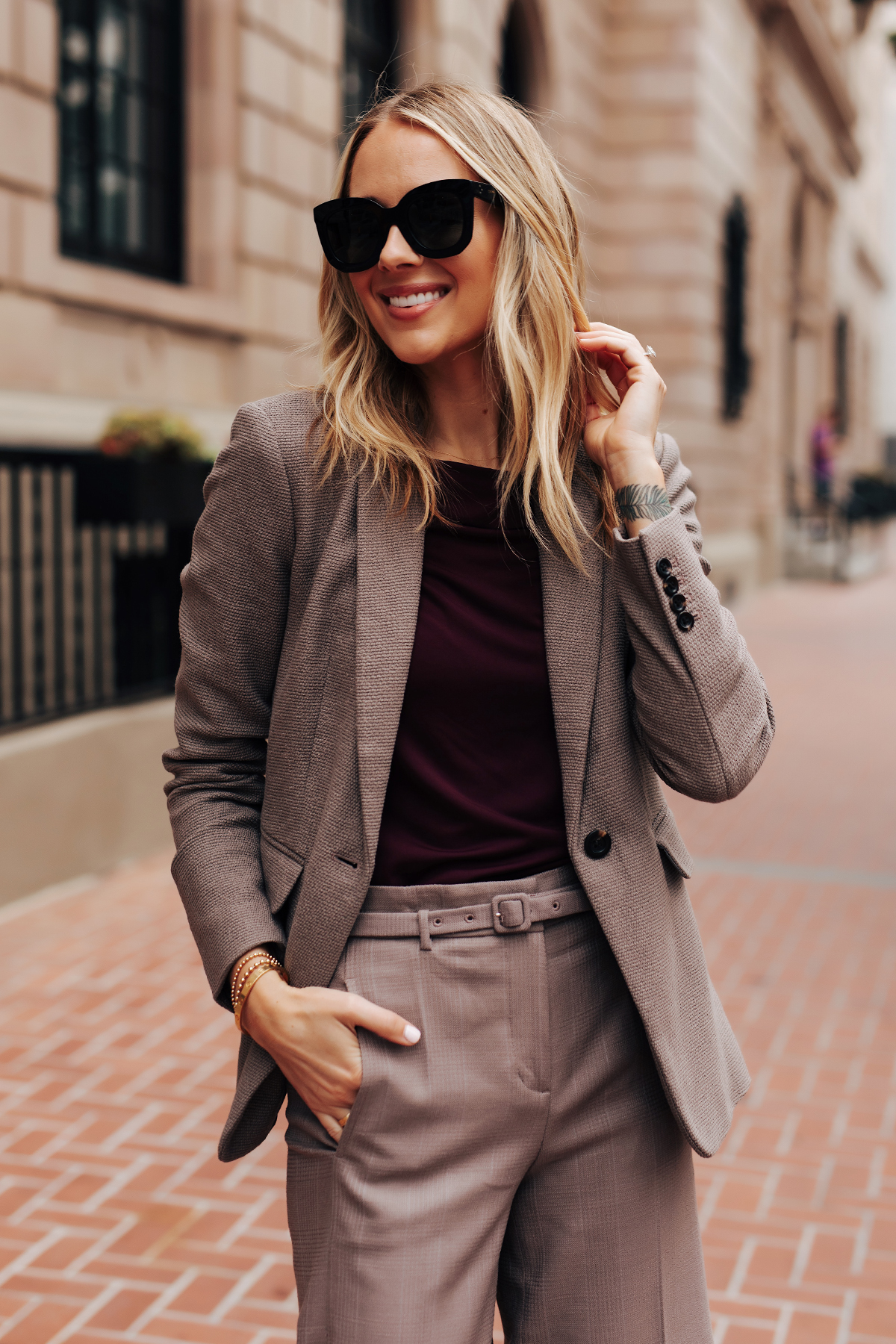 Fashion Jackson Wearing Ann Taylor Taupe Blazer Purple Top Taupe Belted Pants Fall Workwear Outfit