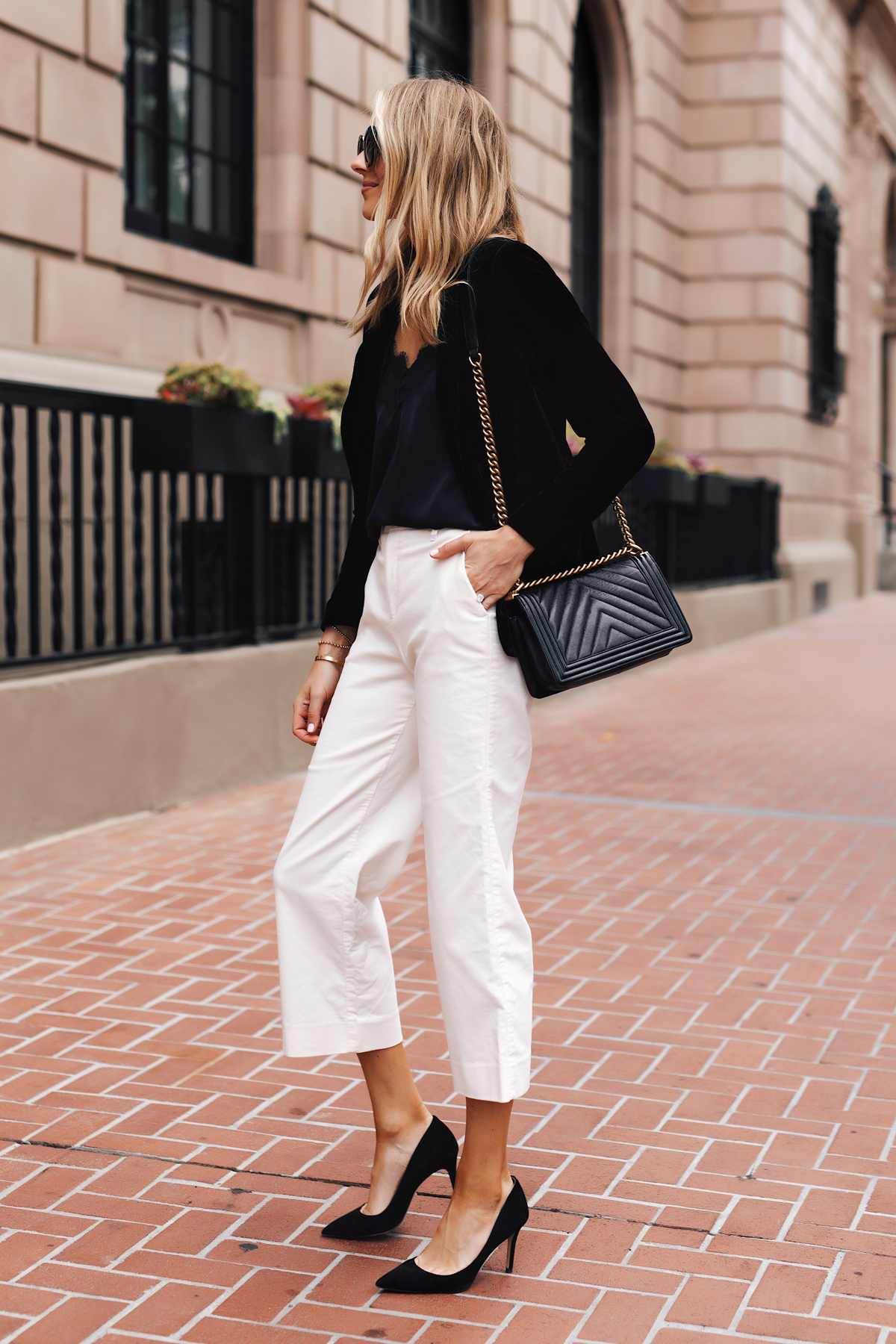 Fashion Jackson Wearing Banana Republic Black Velvet Blazer Black Lace Cami White Corduroy Cropped Pants Black Pumps Black Handbag Holiday Outfit